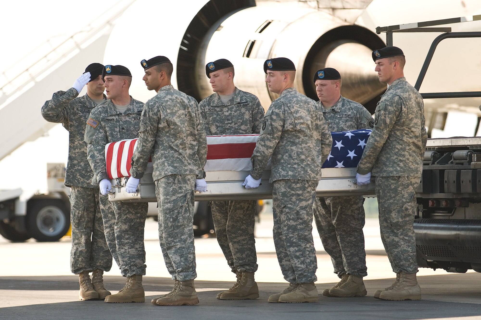 A U.S. Army carry team transfers the remains of Army Pfc. Gunnar R. Hotchkin, of Naperville, Ill., at Dover Air Force Base, Del., June 18. (U.S. Air Force photo/Roland Balik)