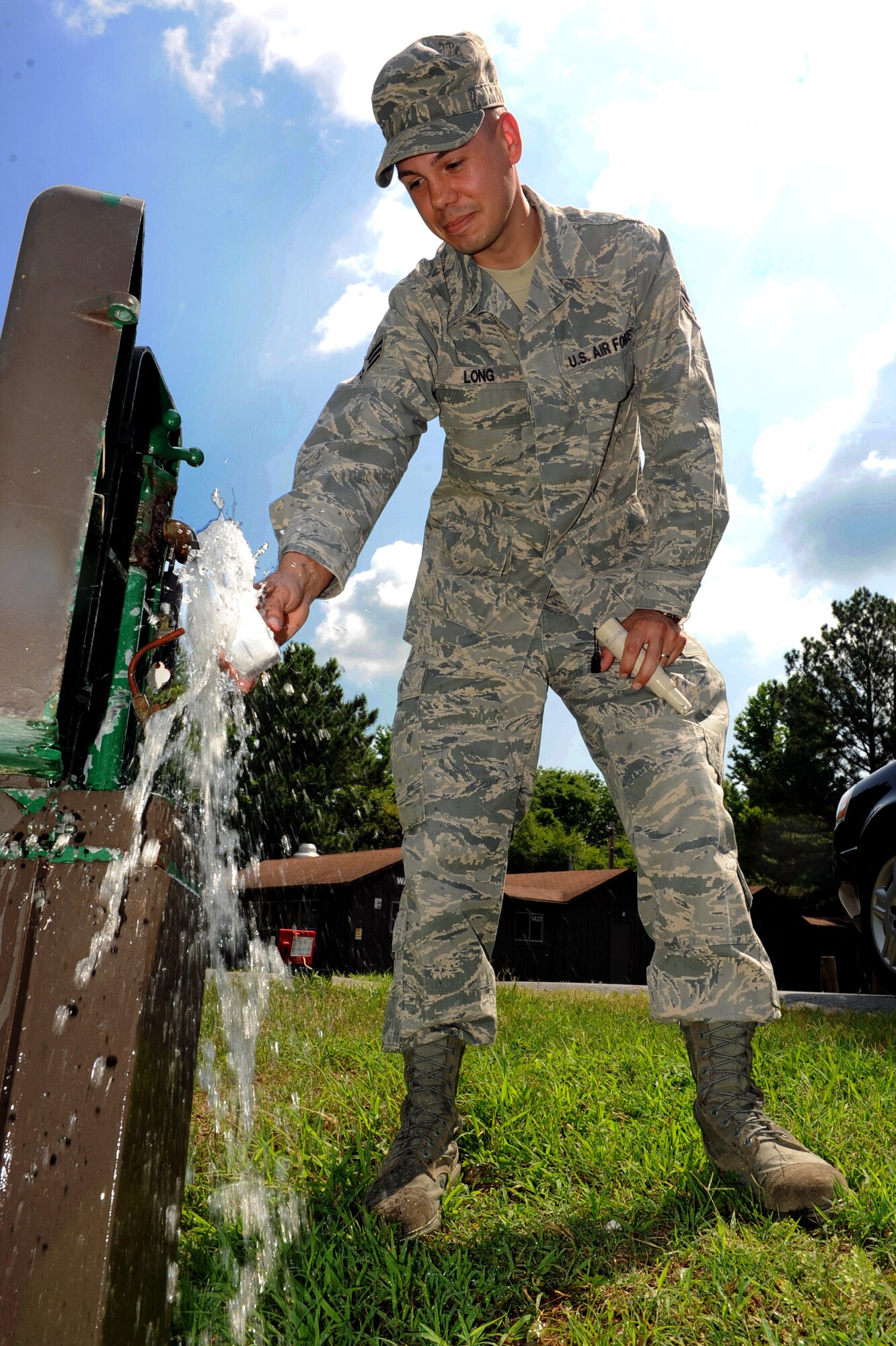 Senior Airman Douglas Long, 19th Aerospace Medicine Squadron bioenvironmental engineering technician, takes a potential hydrogen sample June 16 to ensure hydrogen levels in the base water supply are safe for consumption. The annual drinking water quality report is designed to inform the public of the results of the bases constant goal to provide its members with a safe and dependable drinking water supply. (U.S. Air Force photo by Senior Airman Ethan Morgan)