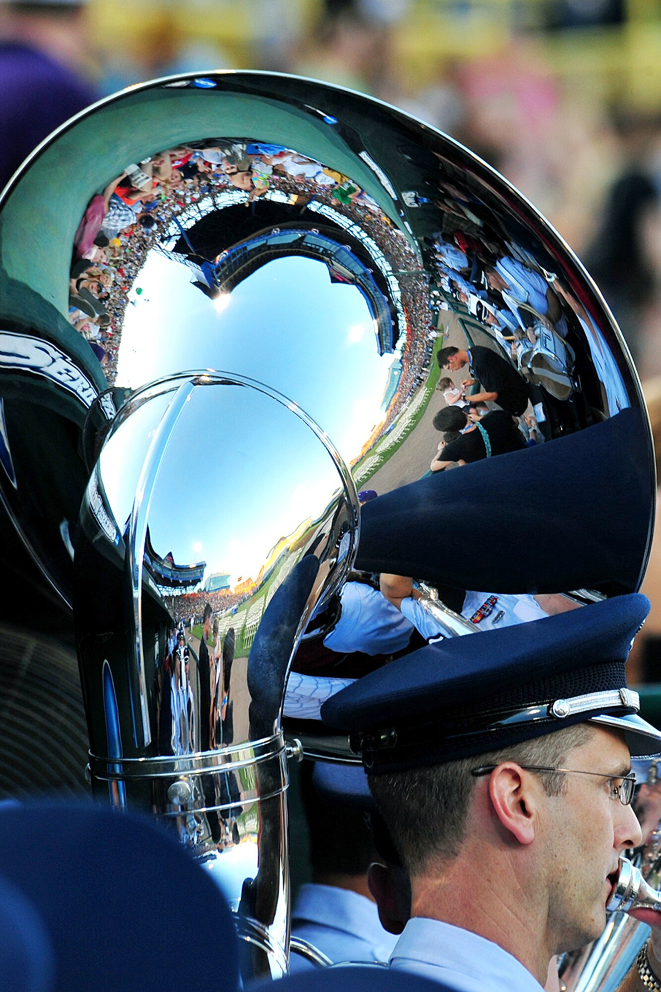 OFFUTT AIR FORCE BASE, Neb. - Staff Sgt. Mark Barnette, a tuba player with the Air Combat Command Heartand of America Band, prepares to entrain the crowd at Rosenblatt Stadium in Omaha, Neb., during the opening ceremony of the College World Series June 18.  This is the last year the College World Series will be held at Rosenblatt Stadium as a new stadium is currently under construction. 

U.S. Air Force photo by charles haymond