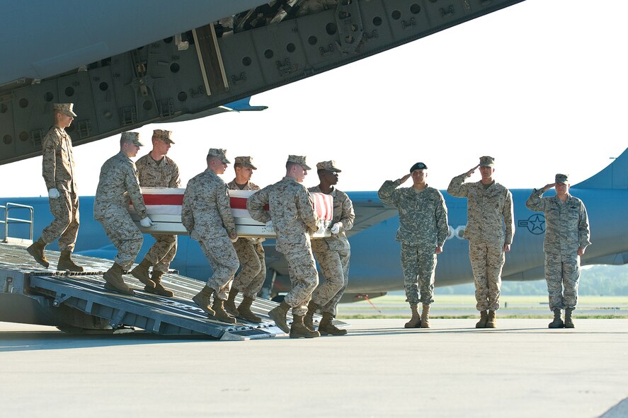 A U.S. Marine Corps team transfers the remains of Marine Corps Lance Cpl. Michael C. Bailey, of Park Hills, Mo., at Dover Air Force Base, Del., June 18, 2010. Lance Cpl. Bailey was assigned to 3rd Battalion, 7th Marine Regiment, 1st Marine Division, I Marine Expeditionary Force, Marine Corps Air Ground Combat Center, based at Twentynine Palms, Calif.  He died June 16 while supporting combat operations in Helmand province, Afghanistan. (U.S. Air Force photo/Roland Balik)