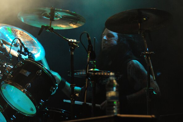 SPANGDAHLEM AIR BASE, Germany -- Jeremy Spencer, drummer for Five Finger Death Punch, plays on stage during a free concert June 10 at the Skelton Memorial Fitness Center. The heavy metal band played a free show for about 500 military members, friends and family just days after playing at Rock am Ring, one of Germany’s largest music festivals. (U.S. Air Force photo/Staff Sgt. Heather Norris)