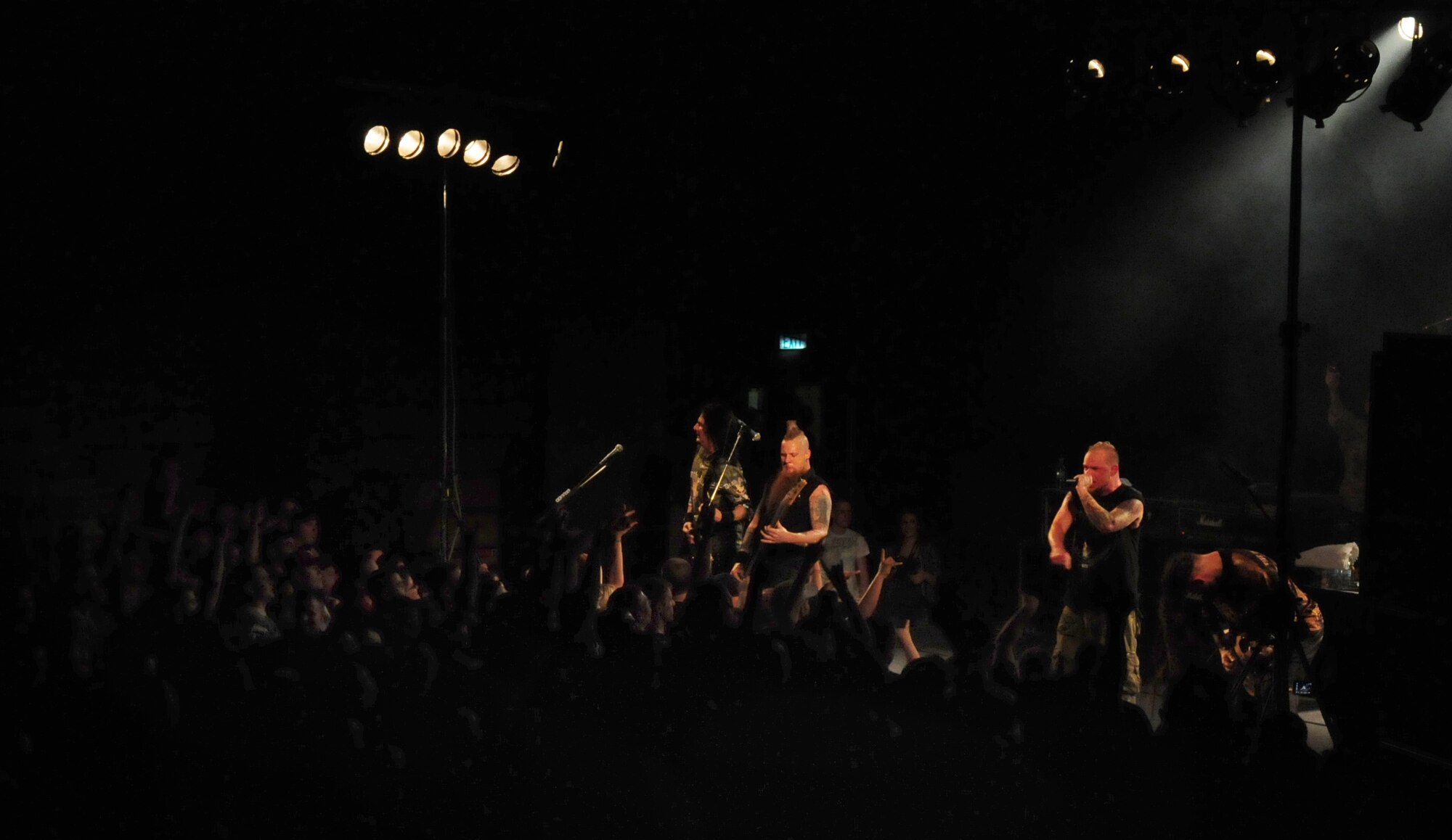 SPANGDAHLEM AIR BASE, Germany -- People from all around the base rush the stage June 10 in the Skelton Memorial Fitness Center as the heavy metal band Five Finger Death Punch played a free show. About 500 military members, friends and family filled the gymnasium just days after the band played at Rock am Ring, one of Germany’s largest music festivals. (U.S. Air Force photo/Staff Sgt. Heather Norris)