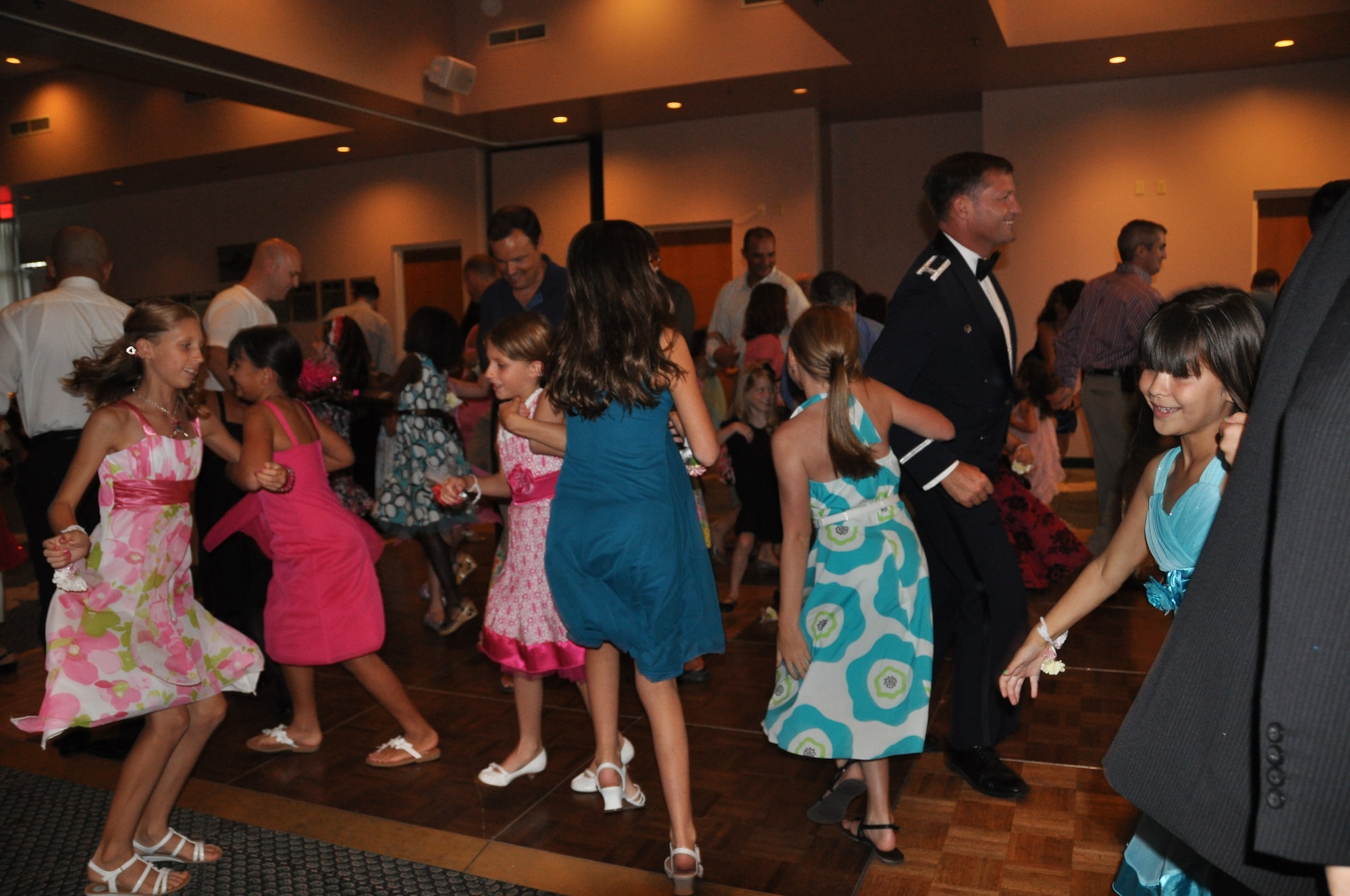 Tyndall father and daughter pairs rock the dance floor during the Daddy Daughter Dance June 17.  (U.S. Air Force photo/Sarah English)
