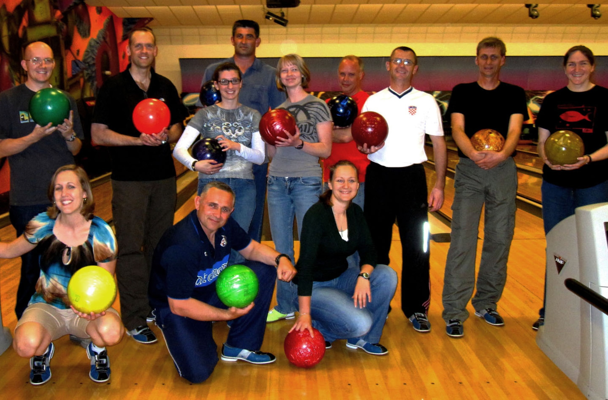 100th Logistics Readiness Squadron logistics readiness officers join Croatian guests for a memorable evening at the RAF Mildenhall Bowling Center. (courtesy photo)
