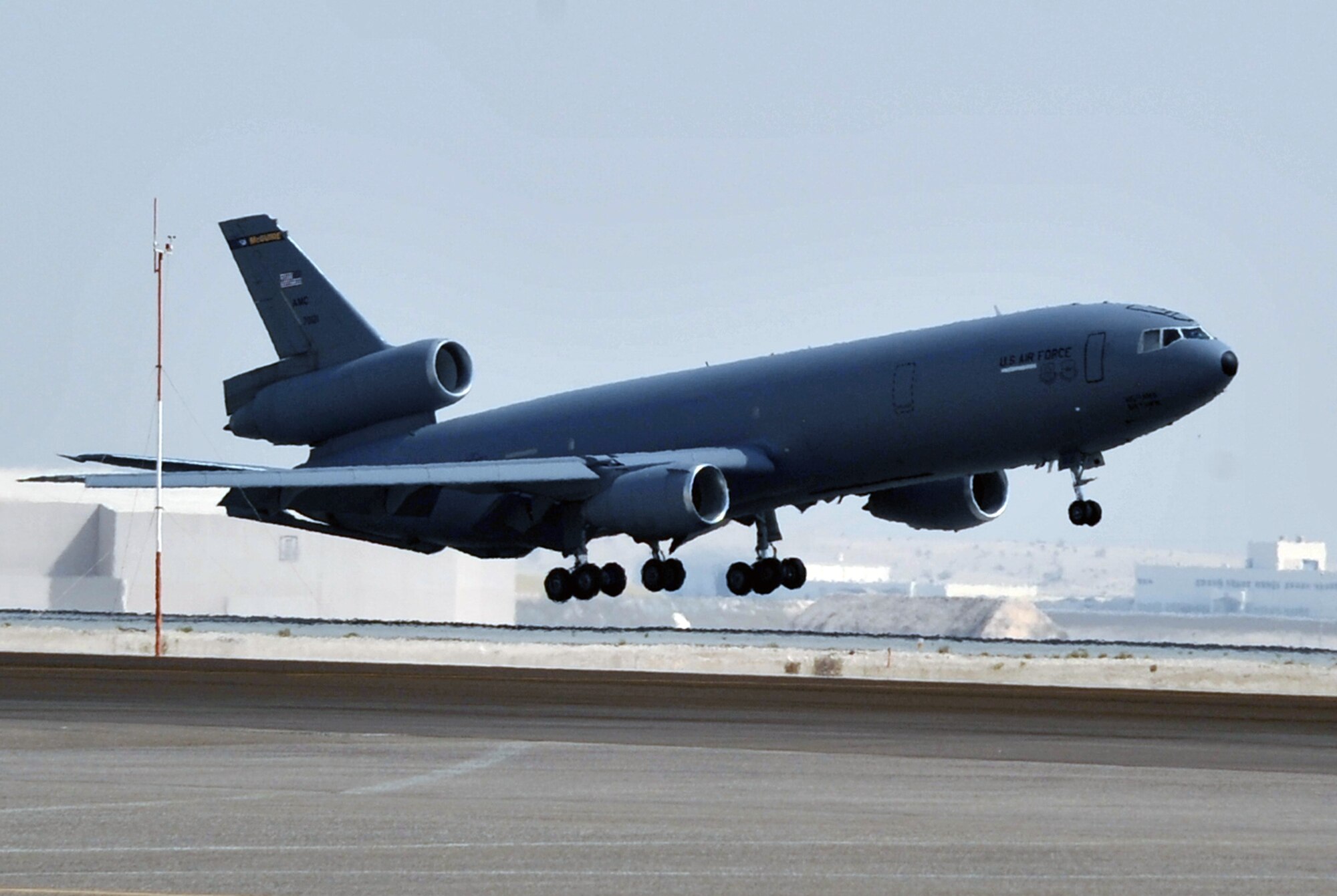A flight crew from the 908th Expeditionary Air Refueling Squadron brings a KC-10 Extender in for a landing June 7, 2010, after completing a combat mission in the U.S. Central Command area of responsibility. The 908th EARS, as part of the 380th Air Expeditionary Wing, supports operations Iraqi Freedom, Enduring Freedom, and the Combined Joint Task Force-Horn of Africa. (U.S. Air Force Photo/Master Sgt. Scott T. Sturkol/Released)