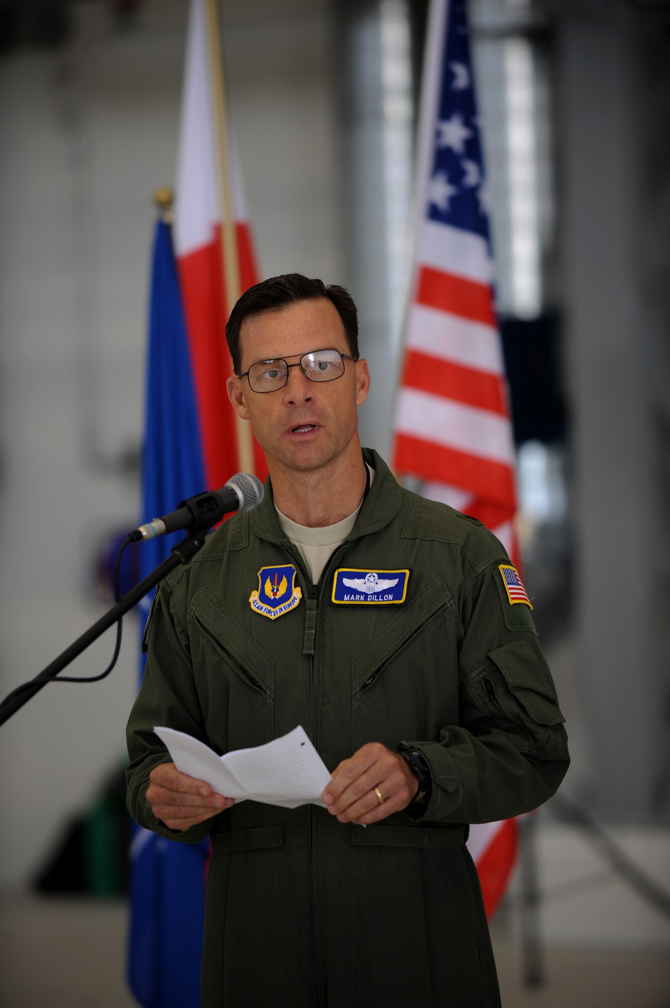 U.S. Air Force Brig. Gen. Mark Dillon, 86th Airlift Wing commander, speaks to U.S.  and Polish Airmen during a ceremony on Powidz Air Base, Poland, June 21, 2010. The purpose General Dillon's visit to Poland was to sign a letter of intention representing the 86th AW and the 3rd Airlift Wing as 'sister wings' and to build partnership with our new 'sister wing'. (U.S. Air Force photo by Airman 1st Class Grovert Fuentes-Contreras)(Released)