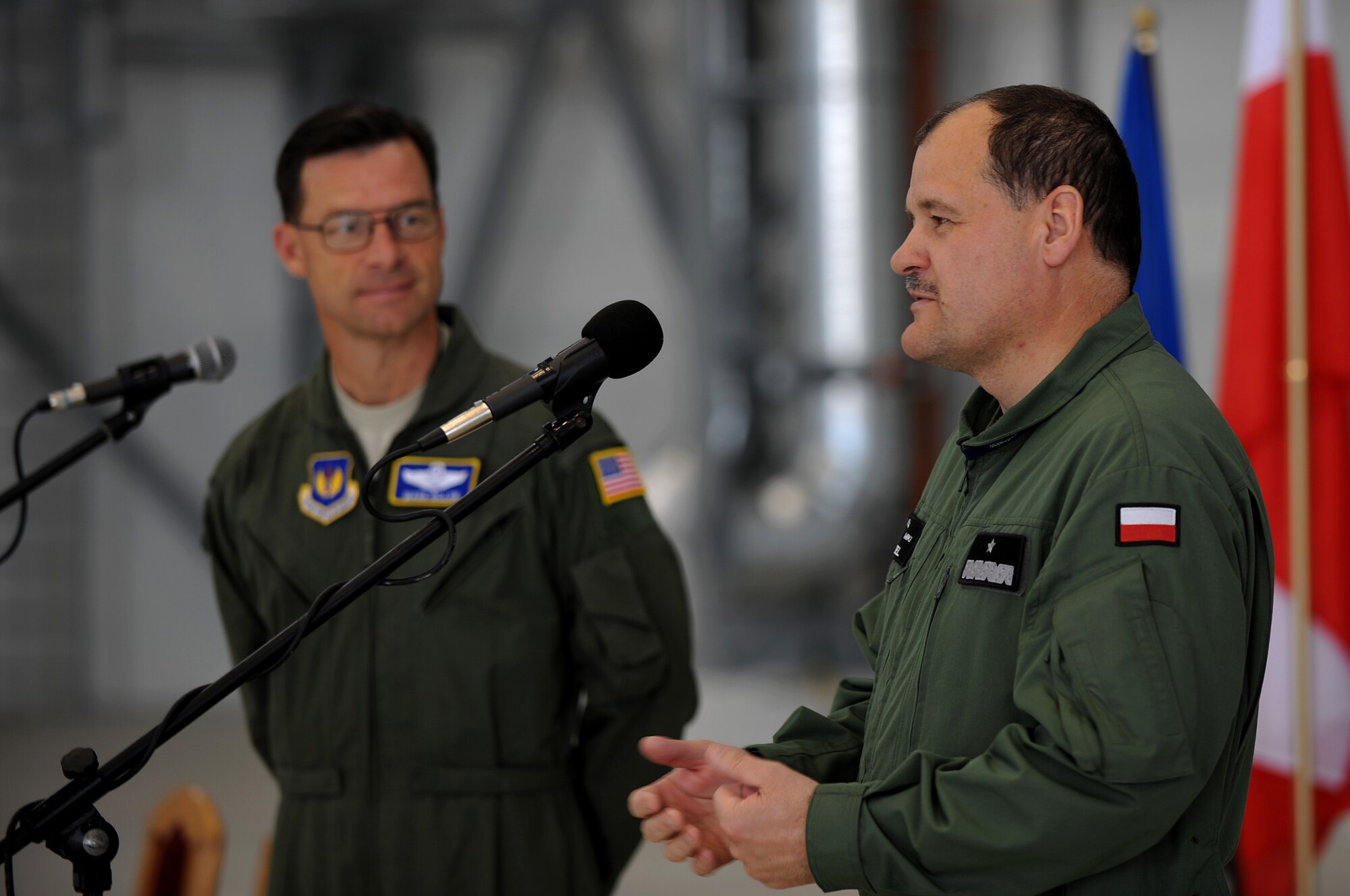 Poland Air Force Brig. Gen. Tadeusz Mikutel, 3rd Airlift Wing commander, speaks to U.S. Air Force and Poland Air Force Airmen during a ceremony on Powidz Air Base, Poland, June 21, 2010. General Dillon's visit to Poland was to sign a letter of intention representing the 86th AW and the 3rd Airlift Wing as 'sister wings' and to build partnership with our new 'sister wing'. (U.S. Air Force photo by Airman 1st Class Grovert Fuentes-Contreras)(Released)