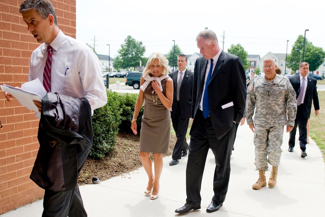 Left to right, Secretary of Education Arne Duncan, Dr. Jill Biden, wife of Vice President Joe Biden, Deputy Defense Secretary William J. Lynn III, and Army Chief of Staff Gen. George W. Casey, Jr., walk into the Ft. Belvoir Elementary School, Va., June 22, 2010, to meet with military members and spouses to discuss the challenges affecting military children and military families.  
