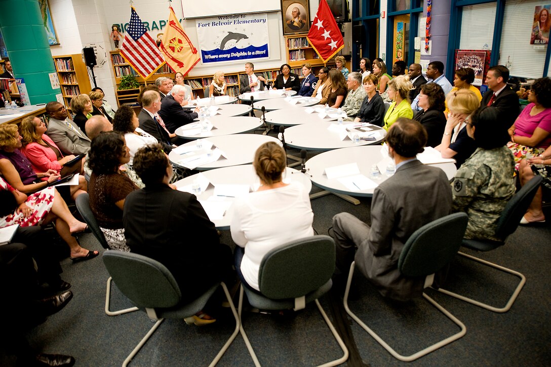 Secretary of Education Arne Duncan, Dr. Jill Biden, Deputy Defense Secretary William J. Lynn III, and Army Chief of Staff Gen. George W. Casey, Jr., and others meet with military members and spouses to discuss the challenges affecting military children and military families at the Ft. Belvoir Elementary School, Va., June 22, 2010.
