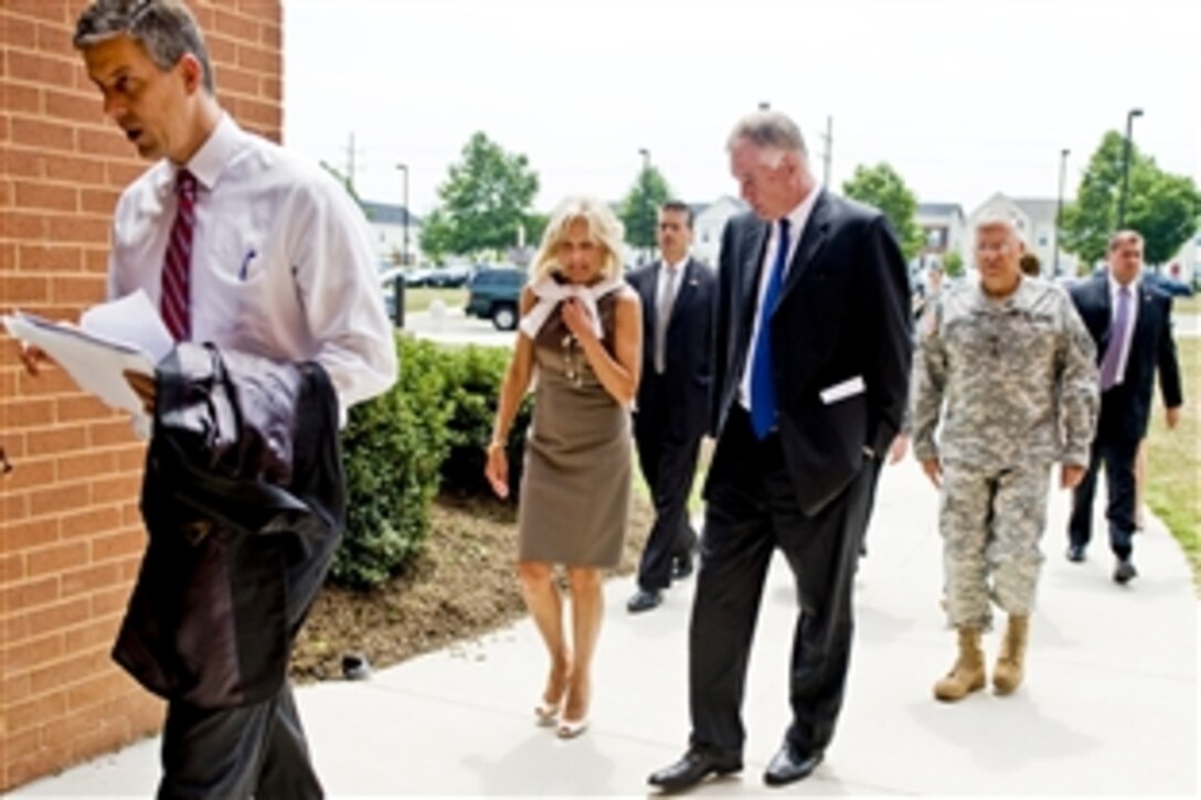 Education Secretary Arne Duncan, left, Dr. Jill Biden, wife of Vice President Joe Biden, Deputy Defense Secretary William J. Lynn III, center right, and Army Gen. George W. Casey Jr., chief of staff, walk into Fort Belvoir Elementary School, Va., June 22, 2010, to meet with military members and spouses to discuss the challenges affecting military children and families.  

