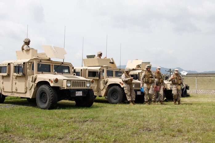 Marines with Marine Wing Support Squadron 171 make preparations during exercise Thunder Horse at the Penny Lake fields here June 22. MWSS-171 trains year-round in order to be ready at a moment’s notice for any situation.