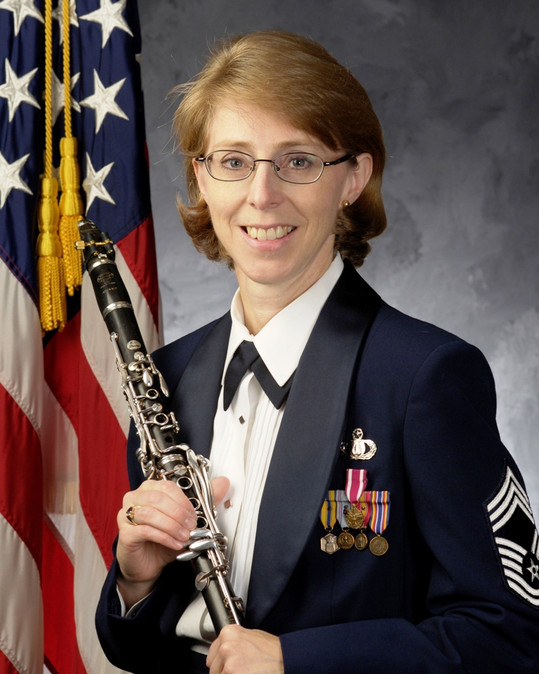 Chief Master Sgt. Sandra Cox, a clarinetist and the Non-Commissioned Officer-in-Charge of the Concert Band, retired from the Air Force in June. Originally from Columbia, S.C., her career in the Air Force began in 1990 as a clarinetist with the United States Air Force Heritage of America Band at Langley Air Force Base in Hampton, Va. She served as principal clarinet with the Band from October 1990 until she won an audition for The United States Air Force Band in January 1997.