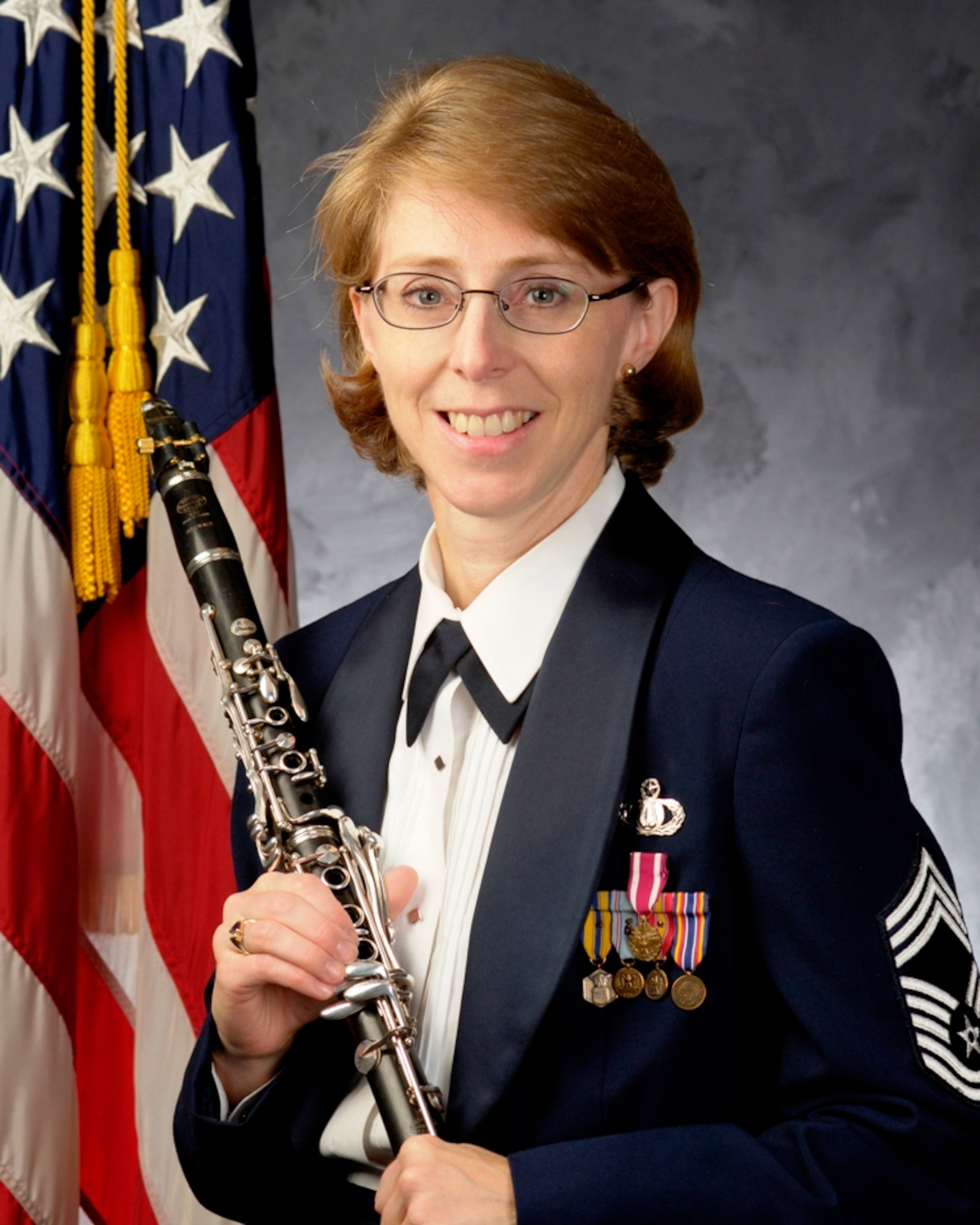 Chief Master Sgt. Sandra Cox, a clarinetist and the Non-Commissioned Officer-in-Charge of the Concert Band, retired from the Air Force in June. Originally from Columbia, S.C., her career in the Air Force began in 1990 as a clarinetist with the United States Air Force Heritage of America Band at Langley Air Force Base in Hampton, Va. She served as principal clarinet with the Band from October 1990 until she won an audition for The United States Air Force Band in January 1997.