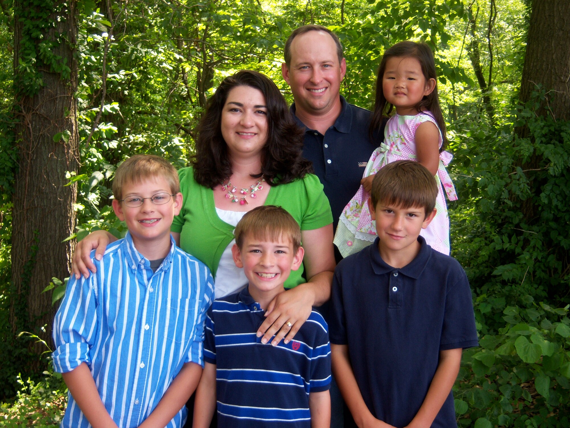 SCOTT AIR FORCE BASE, Ill. -- The Grove family—Caleb, Camden, Cody, Christa, Stephen, and Caitlyn.  Christa and Stephen Grove adopted Caitlyn in 2008. (Courtesy Photo) 