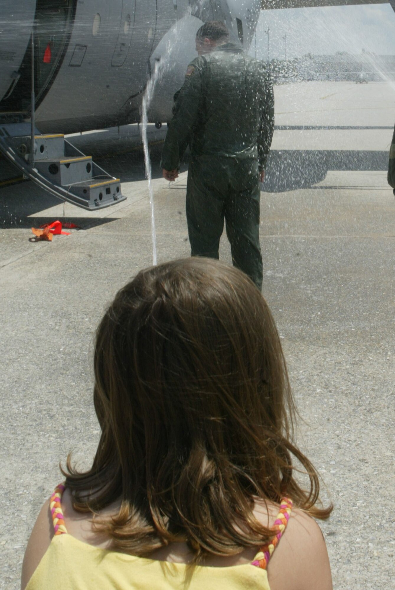 Maj. Ralph C. Clark completed his Fini Flight June 23 which marks him transitioning from the 700 Airlift Squadron here to the 601st Air and Space Operations Center of Tyndell Air Force Base, Fl.  Maj. Clark was greeted by family, friends and co-workers with coolers of ice-water and fire extinguishers upon exiting the C-130.