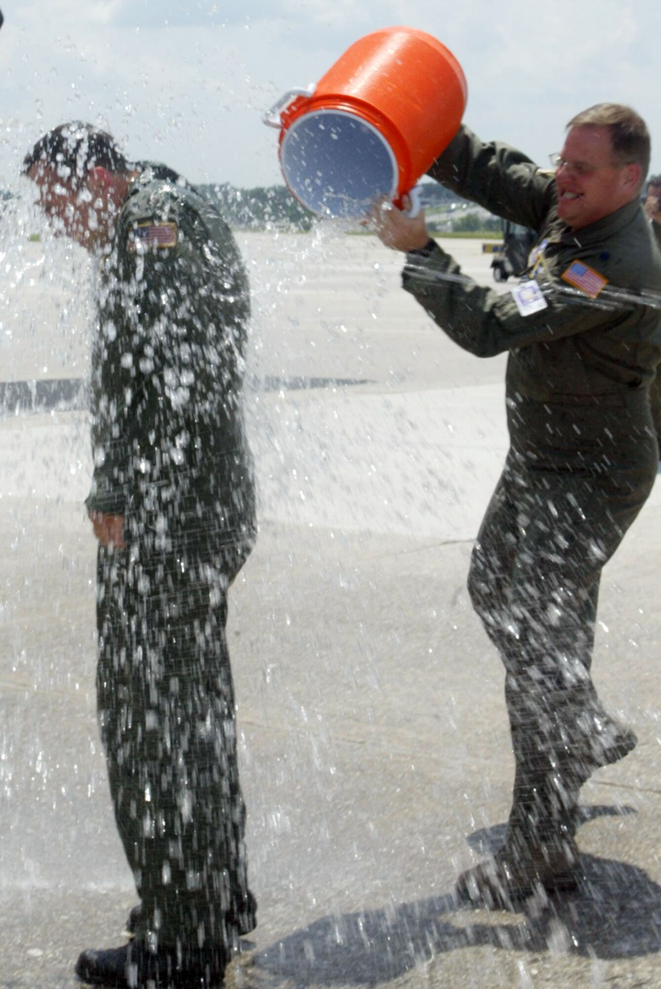 Maj. Ralph C. Clark completed his Fini Flight June 23 which marks him transitioning from the 700 Airlift Squadron here to the 601st Air and Space Operations Center of Tyndell Air Force Base, Fl.  Maj. Clark was greeted by family, friends and co-workers with coolers of ice-water and fire extinguishers upon exiting the C-130.