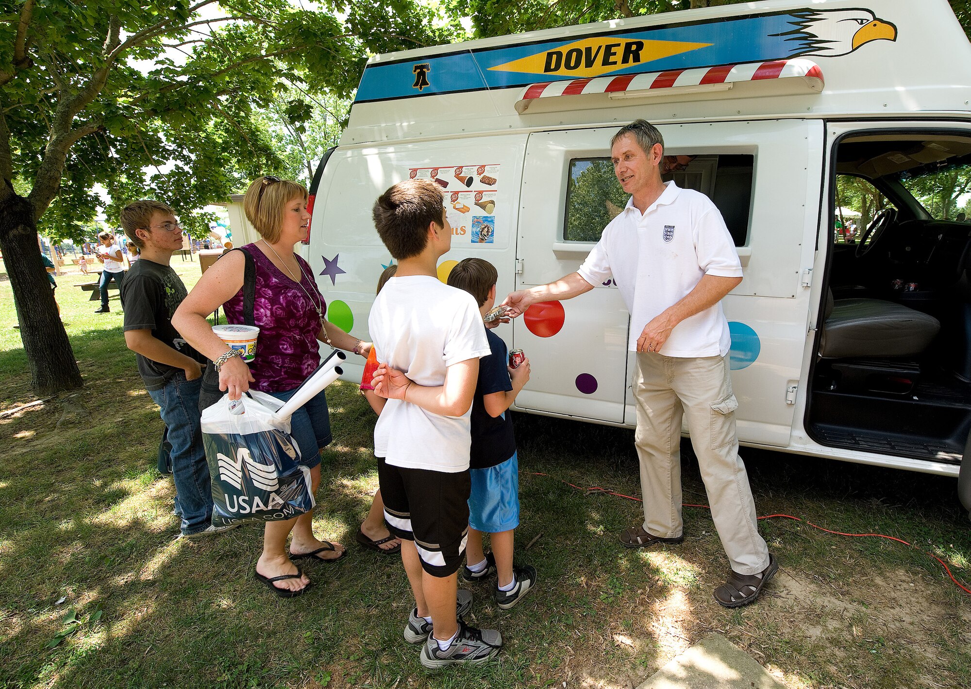 Team Dover members received free ice cream during the Dover Air Force Base Wing Picnic June 18.  The Dover AFB ice cream van runs only during the summer months around Dover AFB and Dover AFB Housing.  (U.S. Air Force photo by Jason Minto/Released)