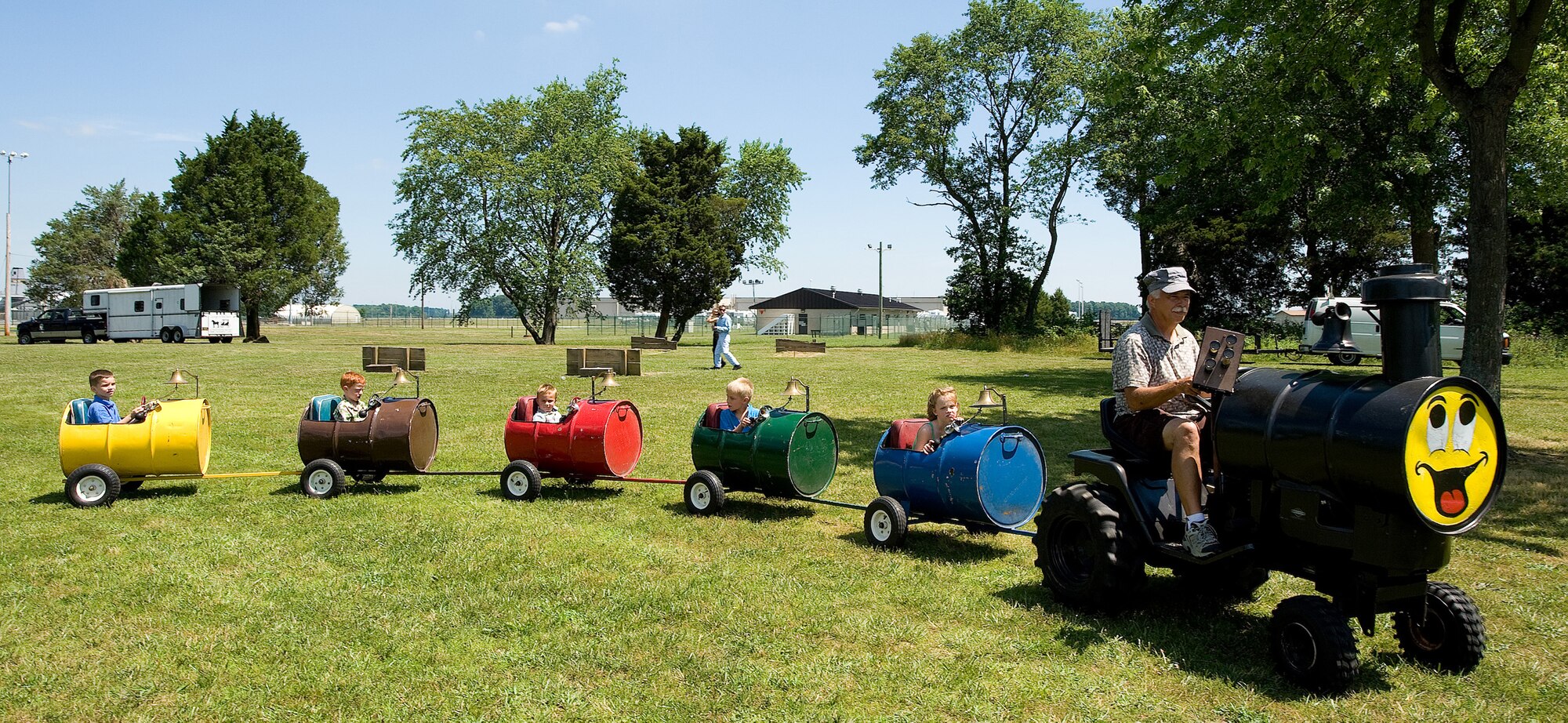 Children ride the train at the Dover Air Force Base Wing Picnic June 18.  There were many events for the children at the wing picnic, including obstacle courses and a dunk tank.  (U.S. Auir Force photo by Jason Minto/Released)