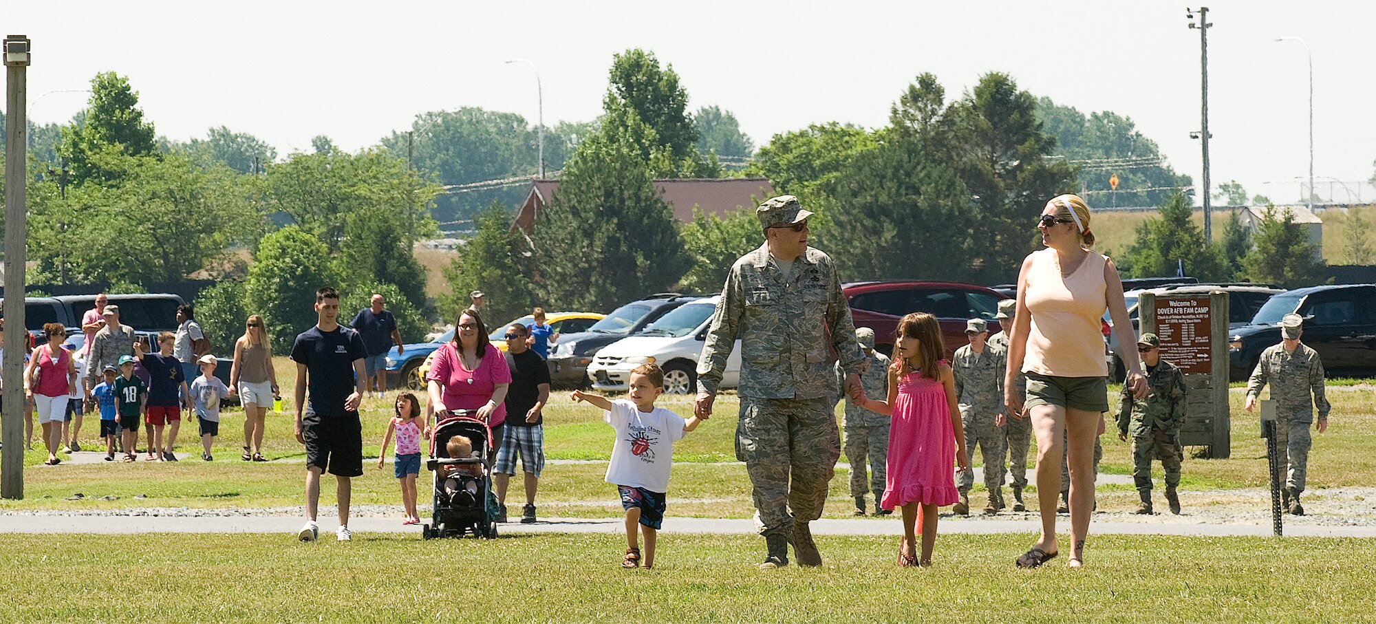 Team Dover members arrive at the Dover Air Force Base Wing Picnic June 18.  The picnic is an annual event held in the usmmer to solidify the base and bring Team Dover closer together.  (U.S. Air Force photo by Jason Minto/Released)