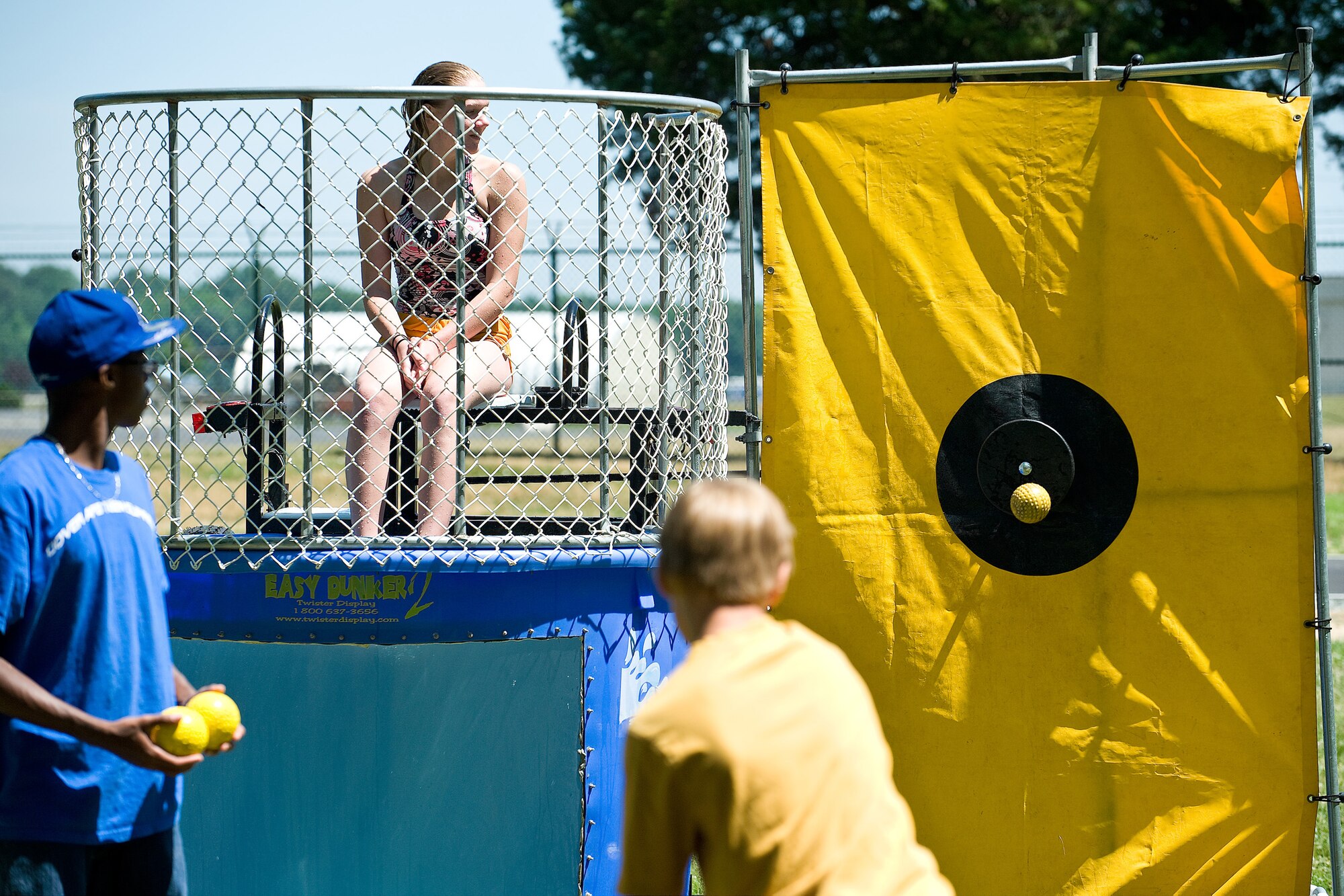Picnic attendees had a chanc eto dunk volunteers at the Dover Air Force Base Wing Picnic June 18.  This was one of many entertaining events held during the picnic.  (U.S. Air Force photo by Roland Balik/Released)