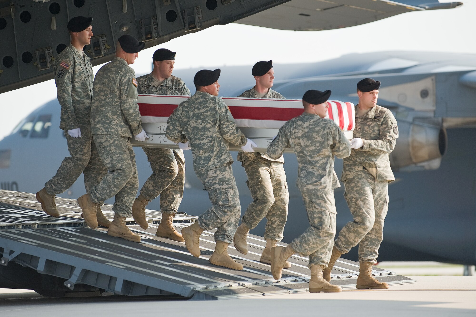 A U.S. Army carry team transfers the remains of Army Pfc. Benjamin J. Park, of Fairfax Station, Va., at Dover Air Force Base, Del., June 20. (U.S. Air Force photo/Roland Balik)