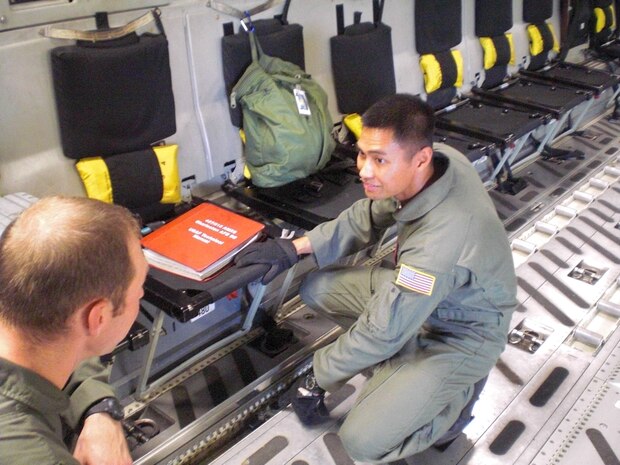 Senior Airman Paolo Santos, 15th Airlift Squadron mission loadmaster