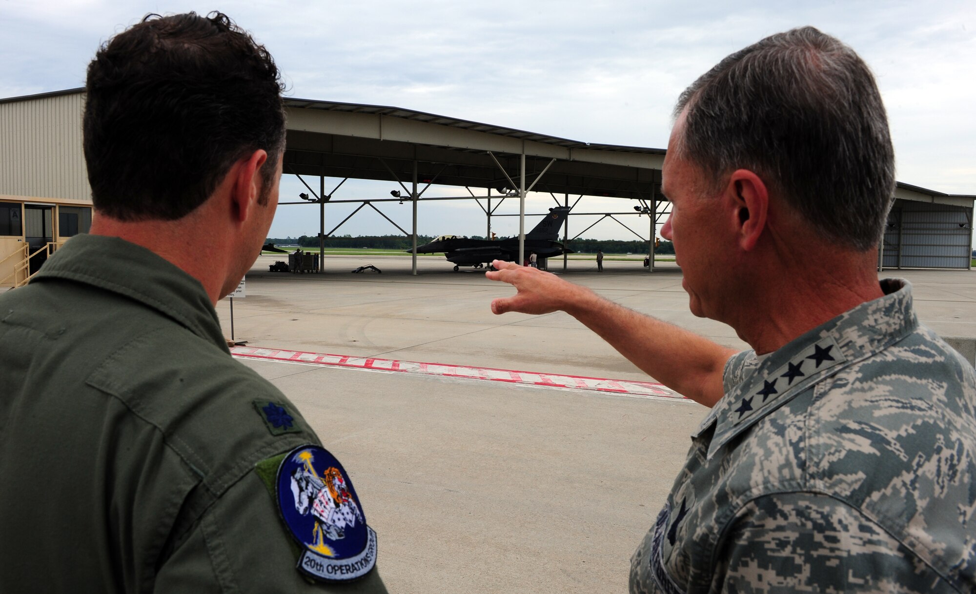 100616-F-6838W-034
SHAW AIR FORCE BASE, S.C.--Gen. William M. Fraser, Air Combat commander (right) and Lt. Col. Mitch Miglori, 20th Operations group F-16 fighter pilot, overlooks an alert exercise of the F-16 fighter jets June 16, 2010. General Fraser and his wife visited Shaw to gain insight into the mission and speak with Airmen from units across the base to hear their concerns.  (U.S. Air Force photo/Airman 1st Class Neil D. Warner)
