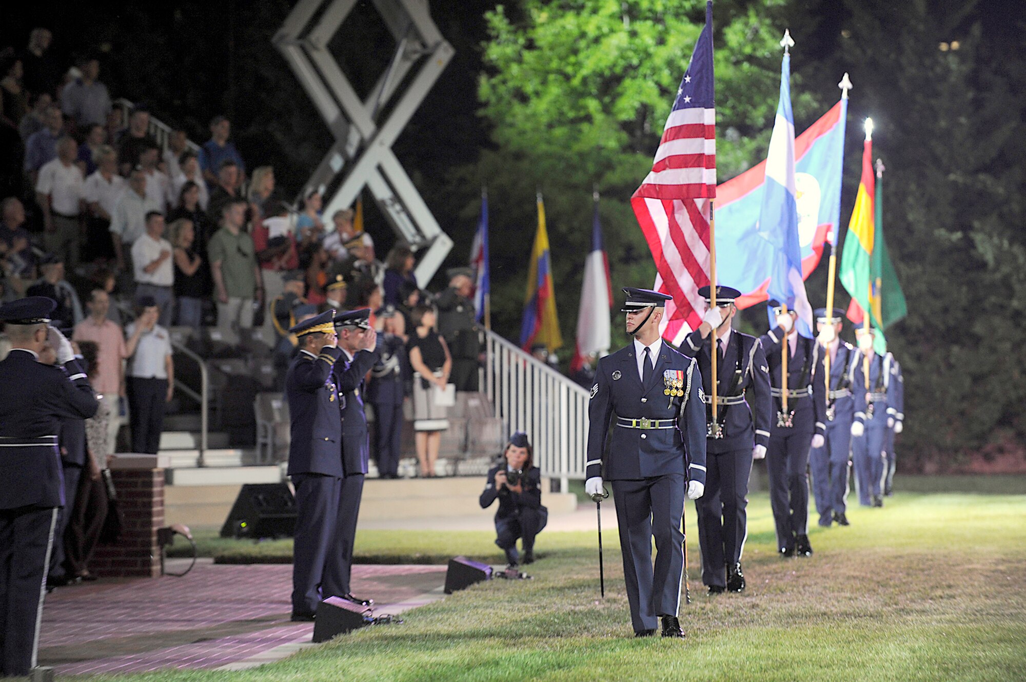 The Honor Guard performs a pass and review for Maj. Gen. Carlos Altuna, the Dominican air force chief of staff, and U.S. Air Force Chief of Staff Gen. Norton Schwartz June 13,2010, at the ceremonial lawn on Bolling Air Force Base, Washington, D.C., during a special tattoo in honor of those attending the "Conference of Chiefs of American Air Forces" (CONJEFAMER). The United States hosted 18 nations here this year as CONJEFAMER celebrated its 50th anniversary.  (U.S. Air Force photo/Scott M. Ash)
