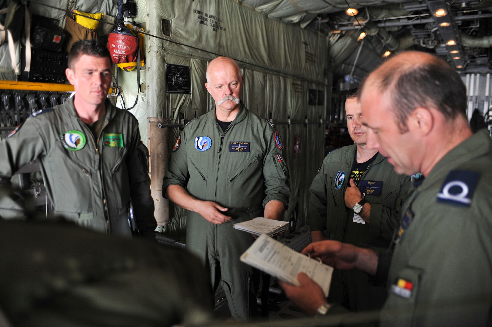 JOINT BASE ELMENDORF-RICHARDSON, Alaska – Members from the Belgian Air Component 15th Air Transport Wing 20th Squadron conduct a preflight brief June 22. This was the first time the BAC has participated in RF-Alaska. (Air Force photo by Airman 1st Class Christopher Gross)