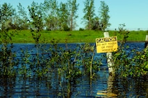 MINOT AIR FORCE BASE, N.D. -- The base has experienced an abnormally high amount of precipitation over the past few weeks resulting in flooding of various areas of the base to include this site operated by the 5th Communications Squadron seen here June 22. (U.S. Air Force photo by Airman 1st Class Aaron-Forrest Wainwright)