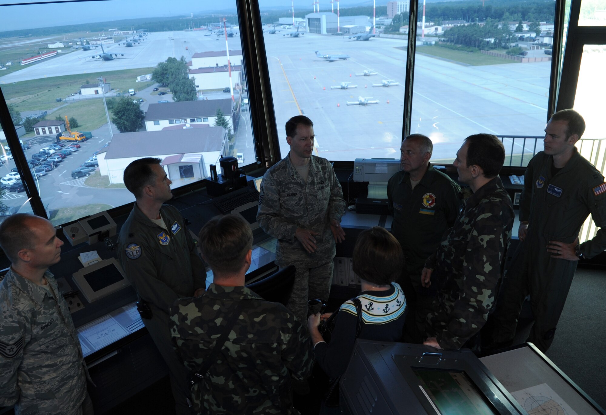 U.S. Air Force Master Sgt. Roy Wanner, 86th Operations Support Squadron air traffic control complex chief controller, gives a tour of the air traffic control tower to Ukraine Air Force members during a visit to Ramstein Air Base, Germany, June 23, 2010.  The goal of the Ukrainian visit was to help advance military interoperability and build international partnerships. (U.S. Air Force photo by Senior Airman Caleb Pierce)