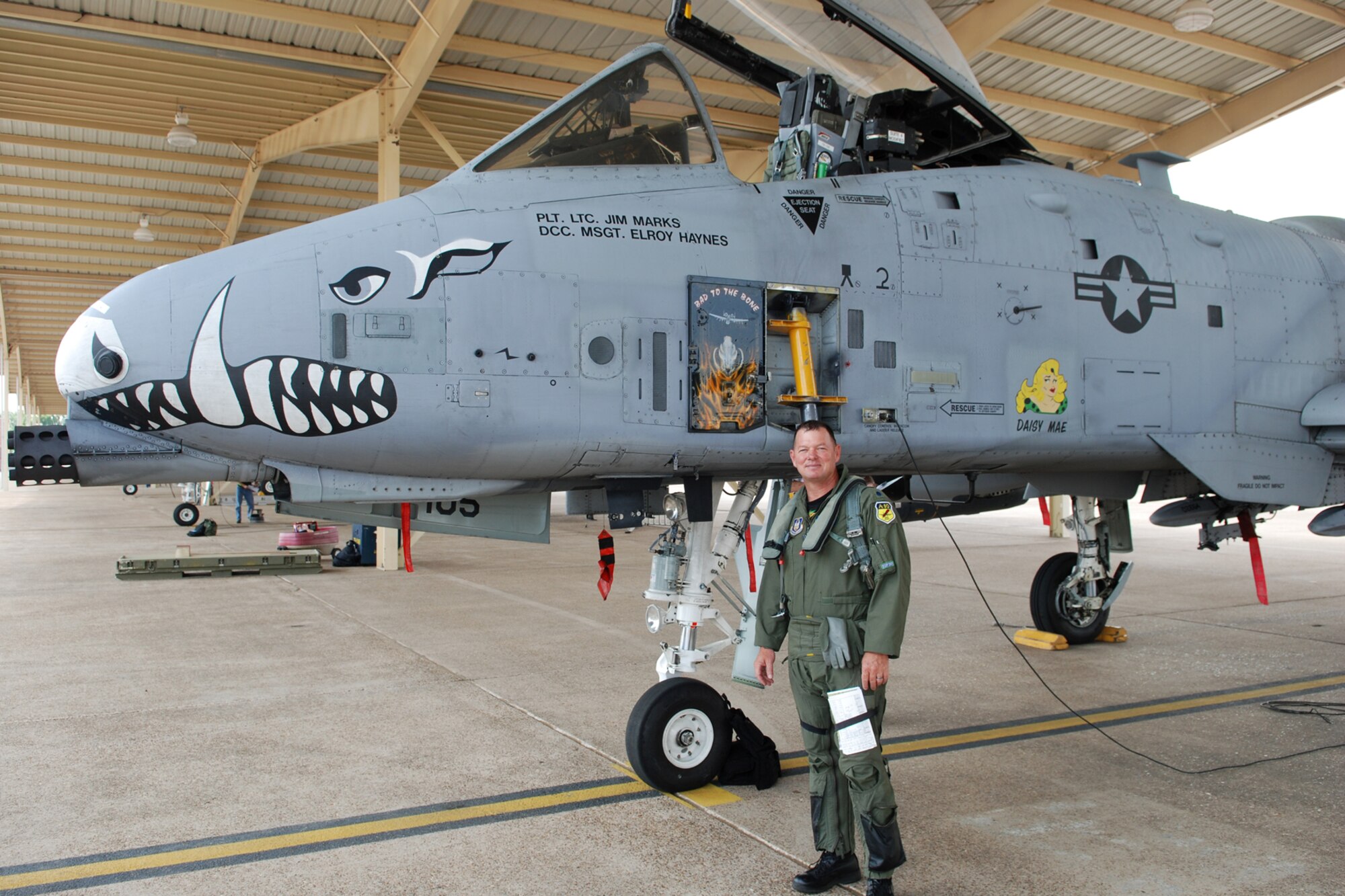 Lt. Col. James “Mace” Macaulay, deputy commander, 917th Operations Group, strikes the customary “Warrior Shot” pose following his return from a sortie that pushed him over the 5000 flying hours mark in an A-10 Thunderbolt II at Barksdale Air Force Base, La., June 21, 2010. (U.S. Air Force photo/Master Sgt. Greg Steele)