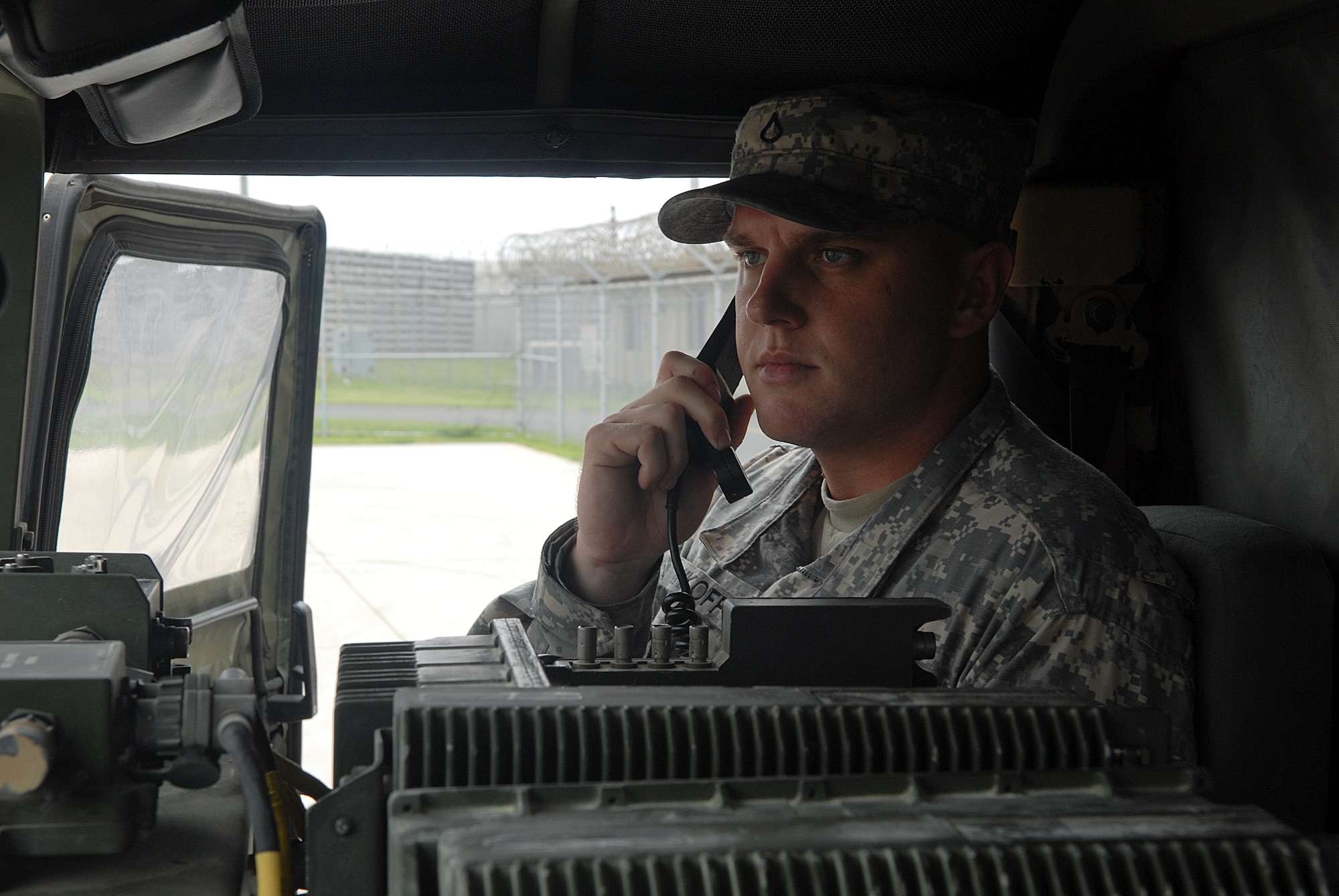 KUNSAN AIR BASE, Republic of Korea -- Private 1st Class Shawn Wikoff, 2-1 Air Defense Artillery Alpha Battery, utilizes a Single Channel Ground and Airborne Radio System. All over Korea, Patriot Advanced Capability Launchers are used in defense of military installations. (U.S. Air Force photo/ Senior Airman Roy Lynch)