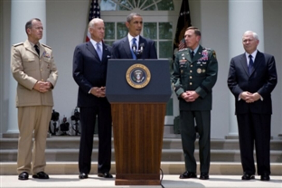 President Barack Obama announces that he has accepted the resignation of Army Gen. Stanley A. McChrystal from his post as the top NATO and U.S. commander in Afghanistan and that he is nominating Army Gen. David H. Petraeus, commander of U.S. Central Command, second right, to replace him, White House Rose Garden, June 23, 2010. Joining the president are Navy Adm. Mike Mullen, chairman of the Joint Chiefs of Staff, far left, Vice President Joe Biden, second left, and Defense Secretary Robert M. Ga