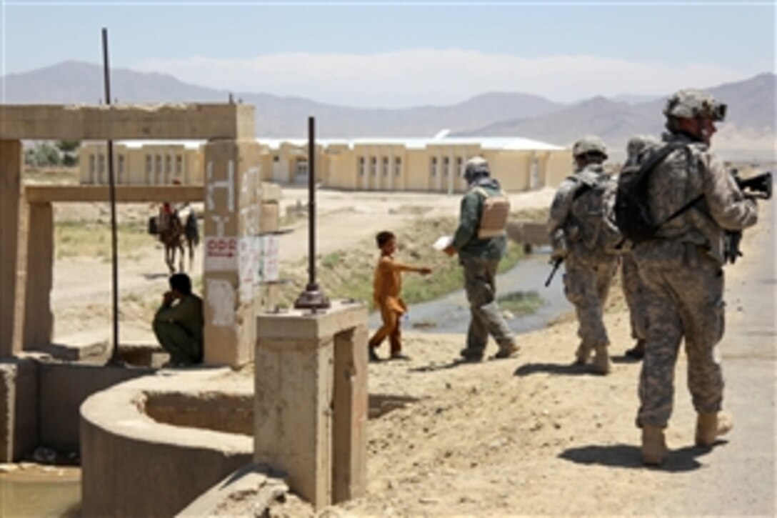 U.S. soldiers patrol the village of Sabikhel, Parwan province, Afghanistan, June 21, 2010, to gather information about the surrounding area.
