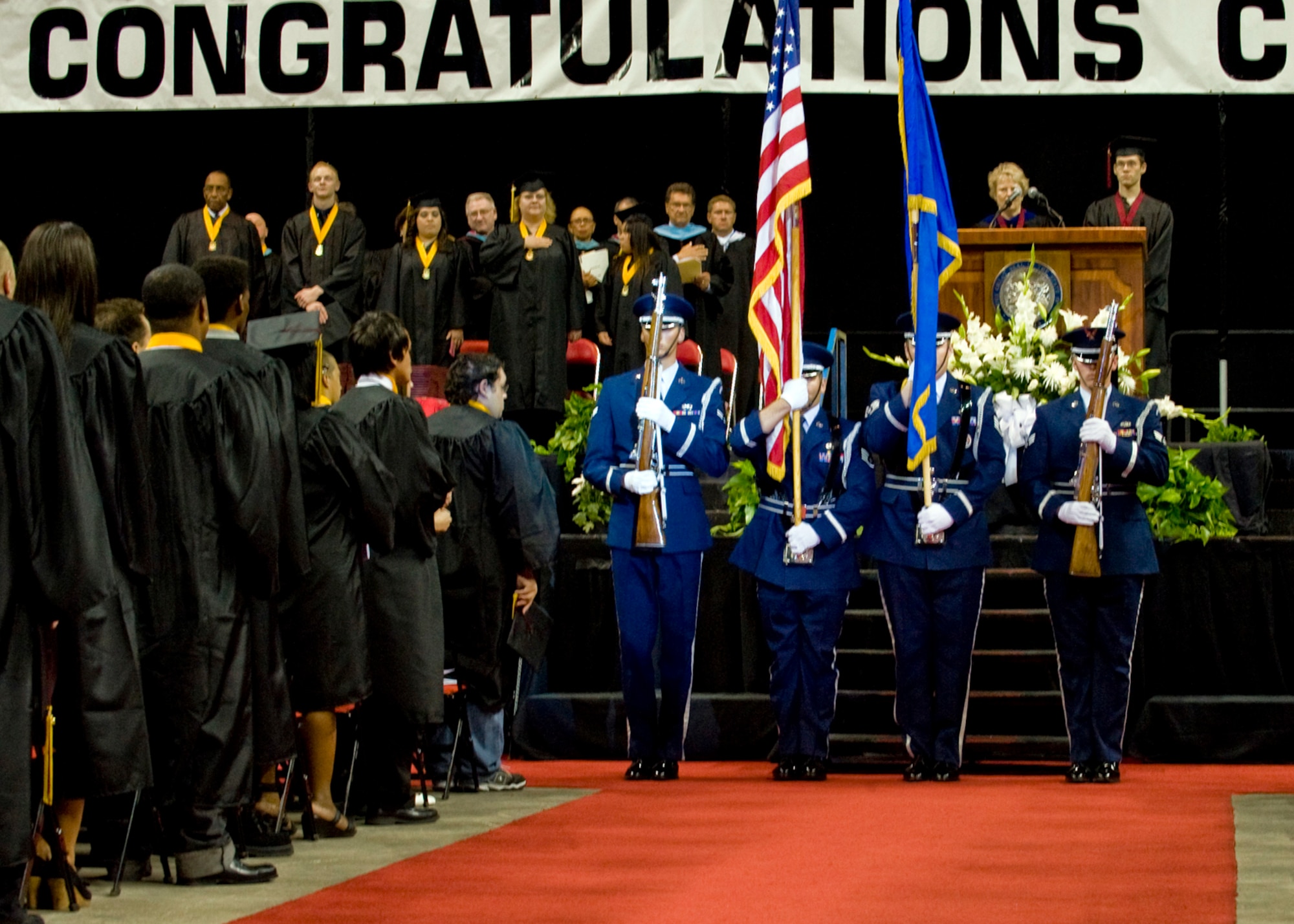 LAS VEGAS, Nev.-- Members of the Nellis Air Force Base Honor Guard present the flag during a high school graduation at the Thomas and Mack Center in Las Vegas, June 9, 2010.
(U.S. Air Force Photo / Airman 1st Class Jamie Nicley)