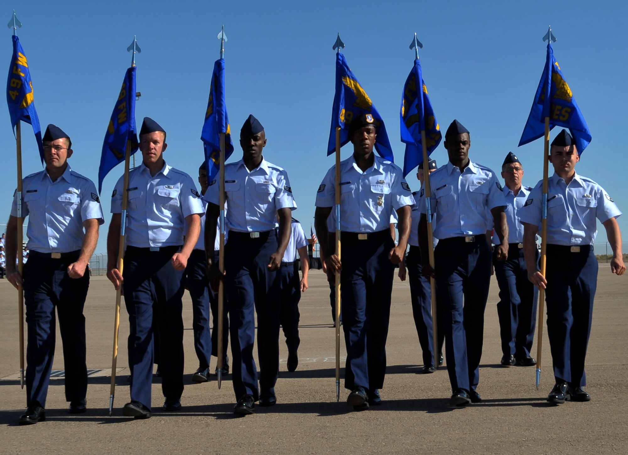 HOLLOMAN AIR FORCE BASE, N.M. -- The 49th Mission Support Group guideon bearers march during the 49th MSG change of command ceremony June 21, 2010. Col. Stephen DiFonzo, relinquished command of the 49th MSG to Col. Robert Cole. Colonel Cole was the director of communications, Air Force Intelligence, surveillance and reconnaissance agency at Lackland AFB, Texas. (U.S. Air Force photo by Airman 1st Class Joshua Turner / Released)
