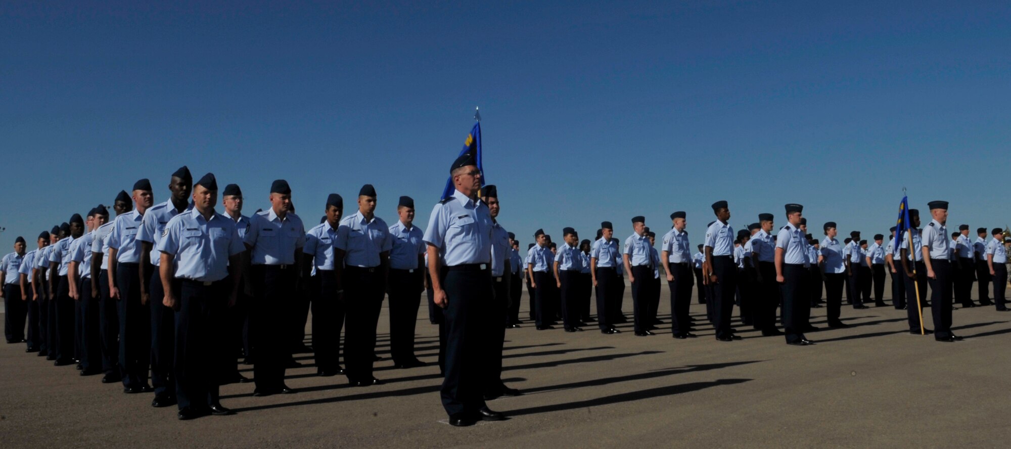 HOLLOMAN AIR FORCE BASE, N.M. -- The 49th Mission Support Group stand at attention during the 49th MSG change of command ceremony June 21, 2010. Col. Stephen DiFonzo, relinquished command of the 49th MSG to Col. Robert Cole. A native of Fort Worth, Texas Colonel Cole enterd the Air Force in 1987 as a graduate of the Reserve Officer Training Corps at Texas Christian University.  (U.S. Air Force photo by Airman 1st Class Joshua Turner / Released)