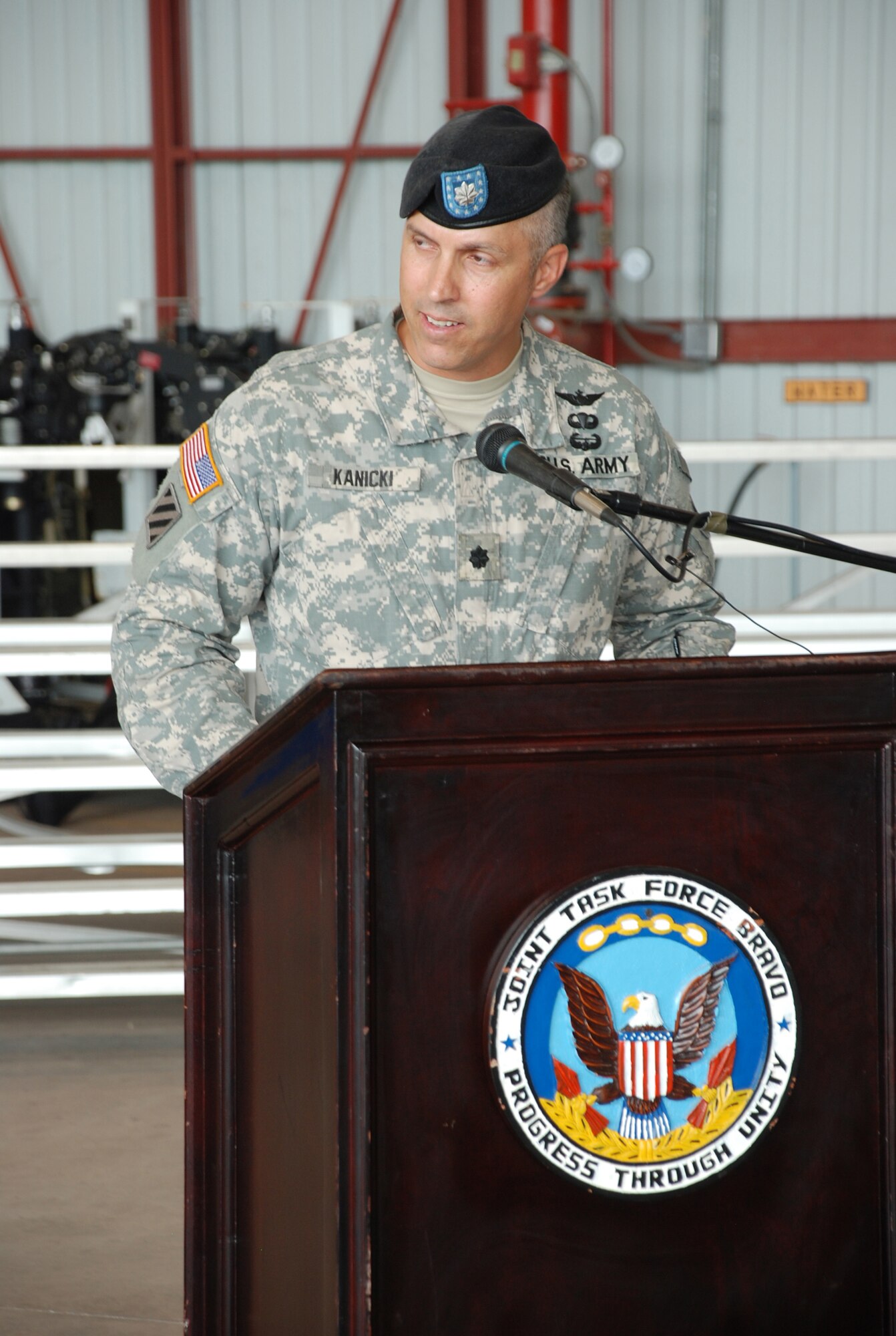 SOTO CANO AIR BASE, Republic of Honduras --  Lt. Col. James Kanicki gives his first speech as commander of the 1st Battalion, 228th Aviation Regiment during a ceremony here June 24. Colonel Kanicki, a native of Ashtabula, Ohio, most recently was commander of the Warrior Transistion Battalion in Fort Stewart, Ga. (U.S. Air Force photo/Tech. Sgt. Benjamin Rojek)