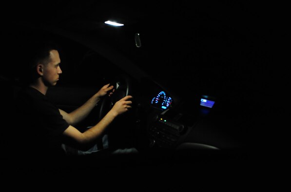 ELLSWORTH AIR FORCE BASE, S.D. -- Senior Airman David Carter, 28th Maintenance Squadron aerospace ground equipment journeyman, drives on winding back-roads at night, June 23.  Driving long distances while tired is equivalent to driving while intoxicated, especially while driving at night due to low visibility. (U.S Air Force photo/Airman 1st Class Anthony Sanchelli)