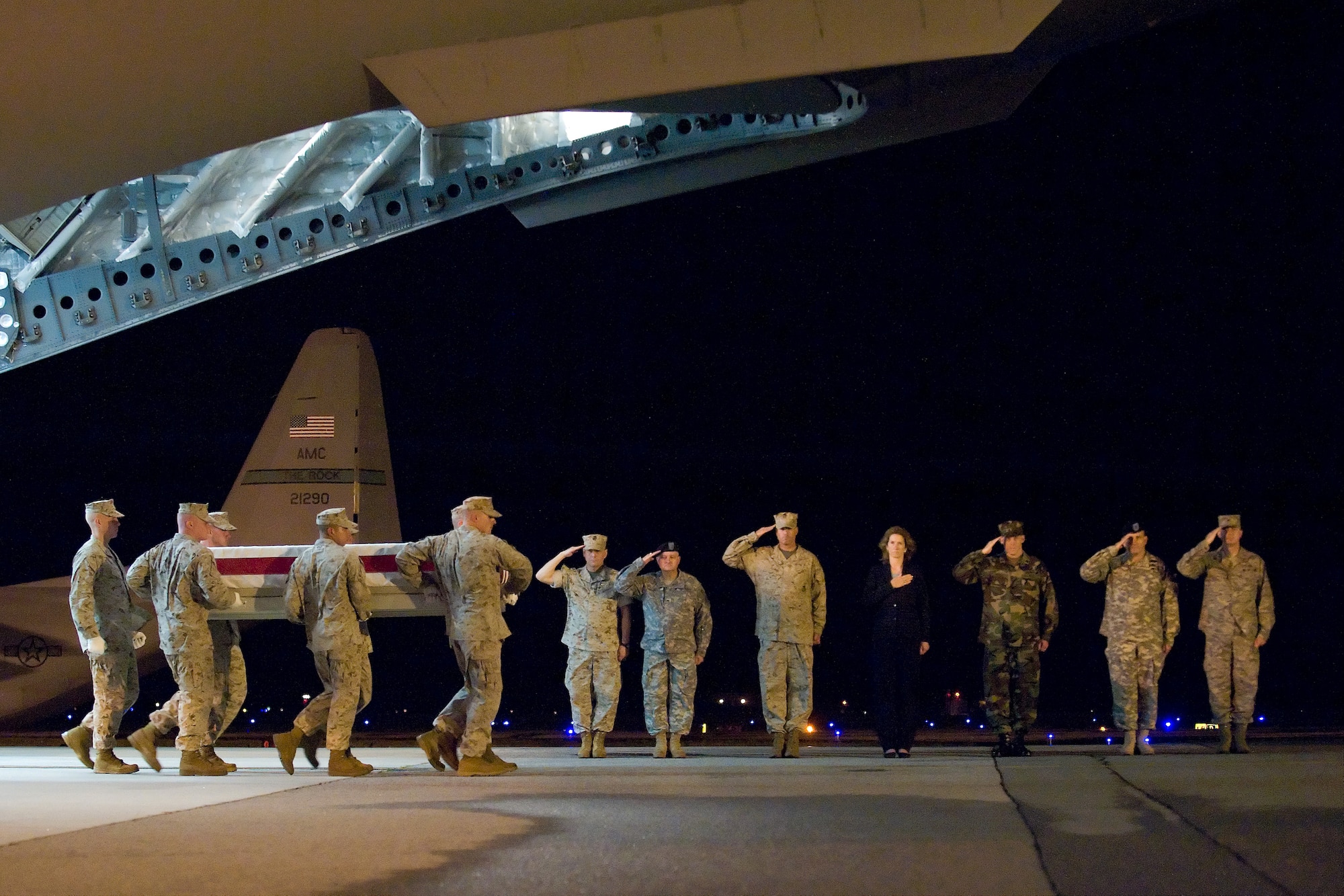 A U.S. Marine Corps team transfers the remains of Marine Corps Lance Cpl. Timothy G. Serwinoski, of North Tonawanda, N.Y., at Dover Air Force Base, Del., June 23. Lance Cpl. Serwinoski was assigned to 3rd Battalion, 6th Marine Regiment, 2nd Marine Division, II Marine Expeditionary Force, Camp Lejeune, N.C. (U.S. Air Force photo/Roland Balik)