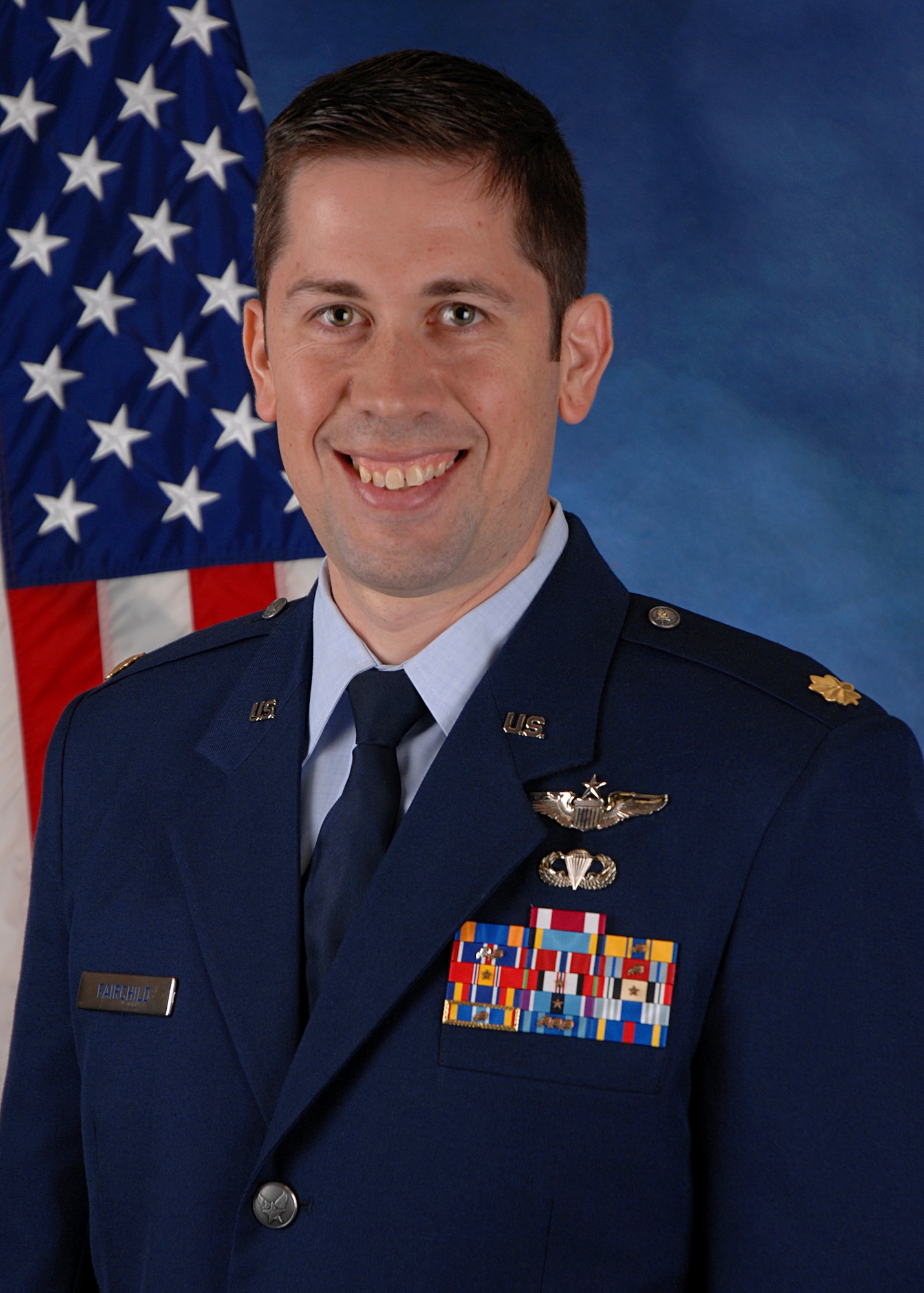 Maj. Ian Fairchild, a C-130 evaluator pilot, was presented with the Edwin E. Aldrin, Sr. award for demonstrating strong personal leadership and accomplishing AFIT's educational objectives in an outstanding manner. He was also awarded the Armed Forces Communications-Electronics Association's C4I Research Excellence Award for his research in the area of electrical and computer engineering. (U.S. Air Force photo by Staff Sgt. Nathan Bevier/Released)