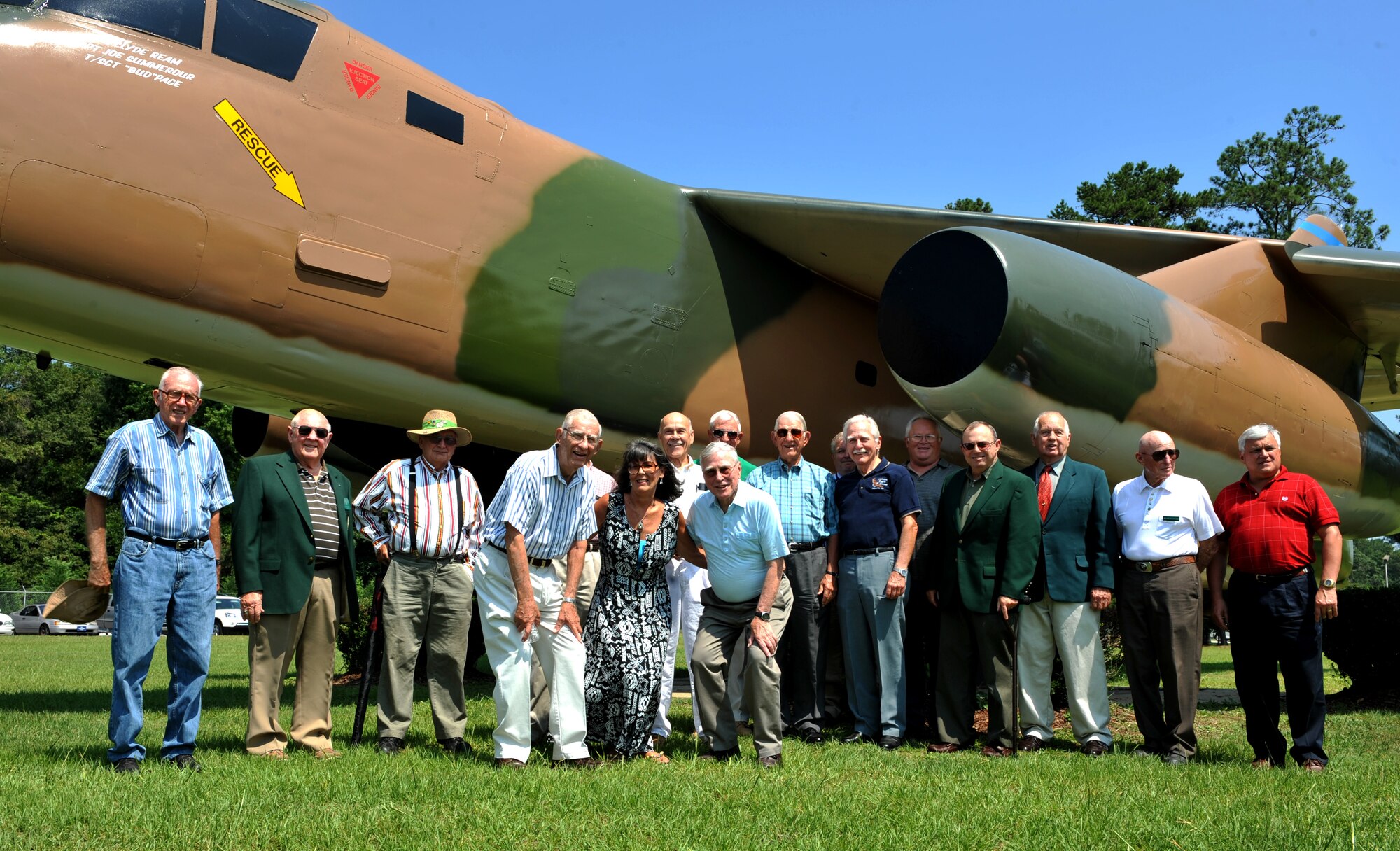 100618-F-4406D-006 SHAW AIR FORCE BASE, S.C.--  A group of retired military members and friends pose for a picture in front of the RB-66C static airplane here, June 18, 2010. People came together to honor Lt. Col. (Ret.) Clyde Ream, Lt. Col. (Ret.) Joe Summerour and Senior Master Sgt. (Ret.) Bud Page, who recently had their names put on the static display. (U.S. Air Force photo / Airman 1st Class Tabatha L. Duarte)