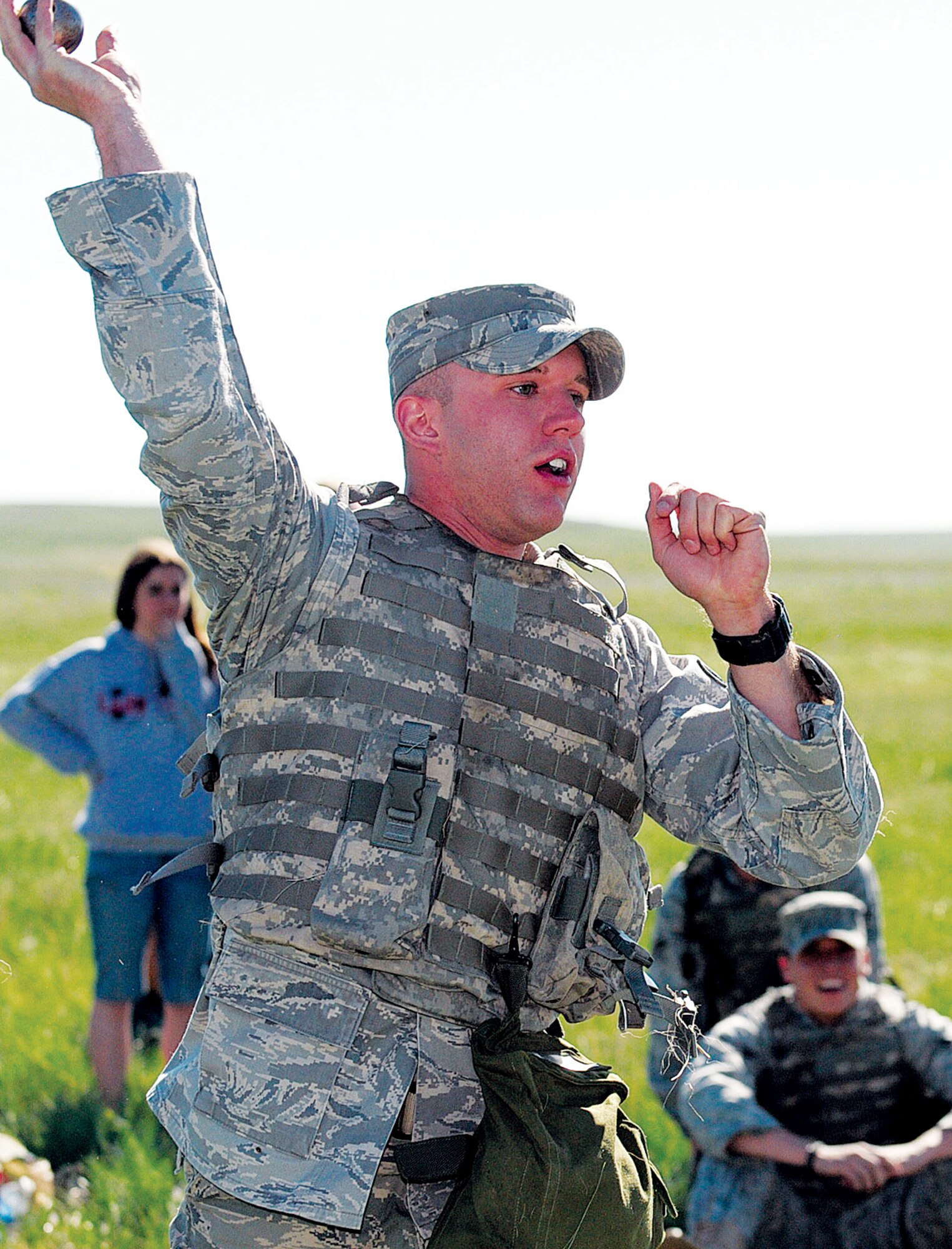 A security forces member tosses a dummy grenade at a target ranging 10 to 25 feet away during Crow Creek Challenge on June 18. Crow Creek Challenge showcases the best of the best of Warren's security forces members. (Photo by Gerald Teano)