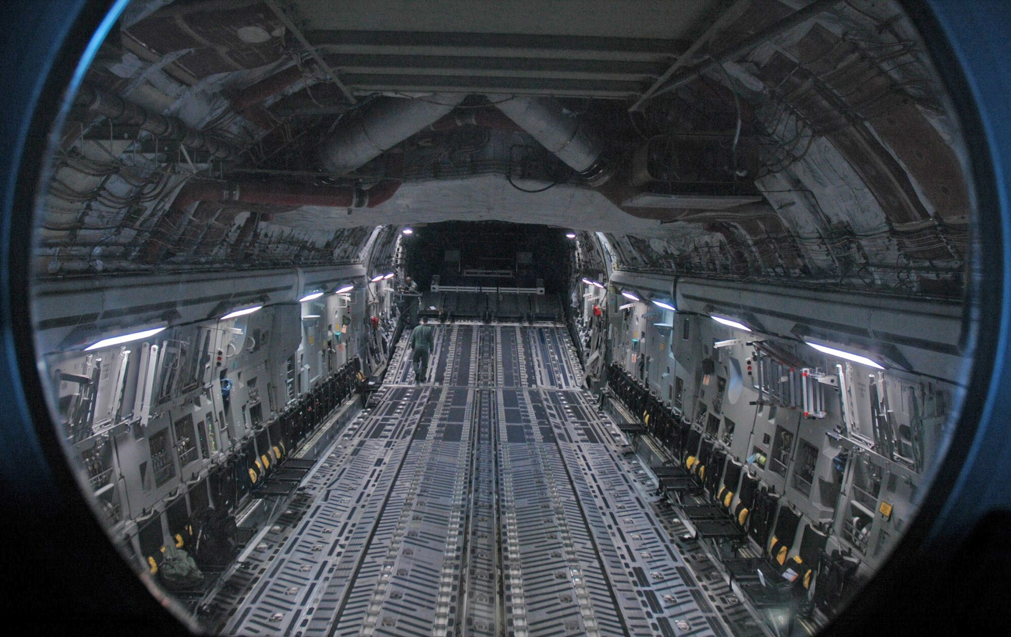 Master Sgt. Johnny Bartosh, C-17 examiner loadmaster with the 315th Airlift Wing at Charleston air Force Base, S.C., prepares to perform a preflight inspection for an airdrop mission. (U.S. Air Force photo by Staff Sgt. Shane Ellis)
