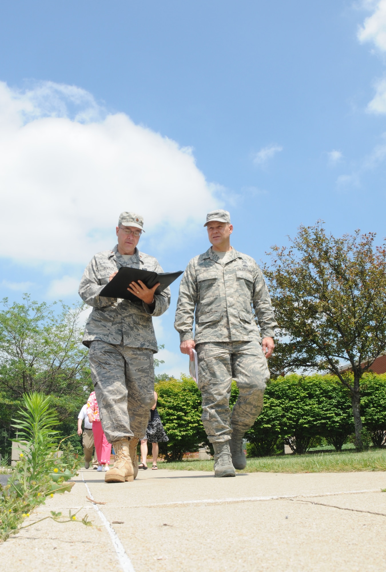 Chief Master Sergeant of the Air Force James A. Roy answers interview questions with Major Gary Bentley while touring the 180th Fighter Wing in Toledo, Ohio June 17, 2010. USAF by SSgt Jodi Leininger (Released)