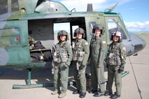The first-ever all-female helicopter crew took to the skies June 21 for a training mission in the Little Belt Mountains. Pictured from left to right are medical technician Senior Airman Malaya Movido; flight engineer Staff Sgt. Michelle Bresson, flight engineer; Capt. Abbe Warren, pilot; and Capt. Katy Tenpenny, co-pilot. (U.S. Air Force photo/Airman 1st Class Kristina Overton)