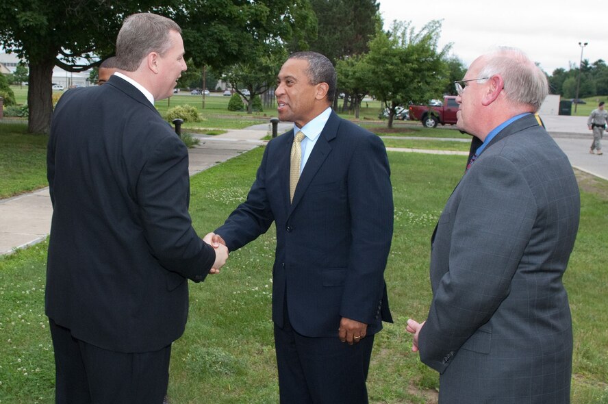 HANSCOM AIR FORCE BASE, Mass. – Massachusetts Gov. Deval Patrick (center) greets Mr. Erich Ledebuhr, Hanscom Middle School principal, while accompanied by Mr. Richard Lombardi, Electronic Systems Center executive director, during his visit on June 17. Governor Patrick visited the base to take part in Hanscom Middle School’s graduation ceremony. (U.S. Air Force photo by Rick Berry)