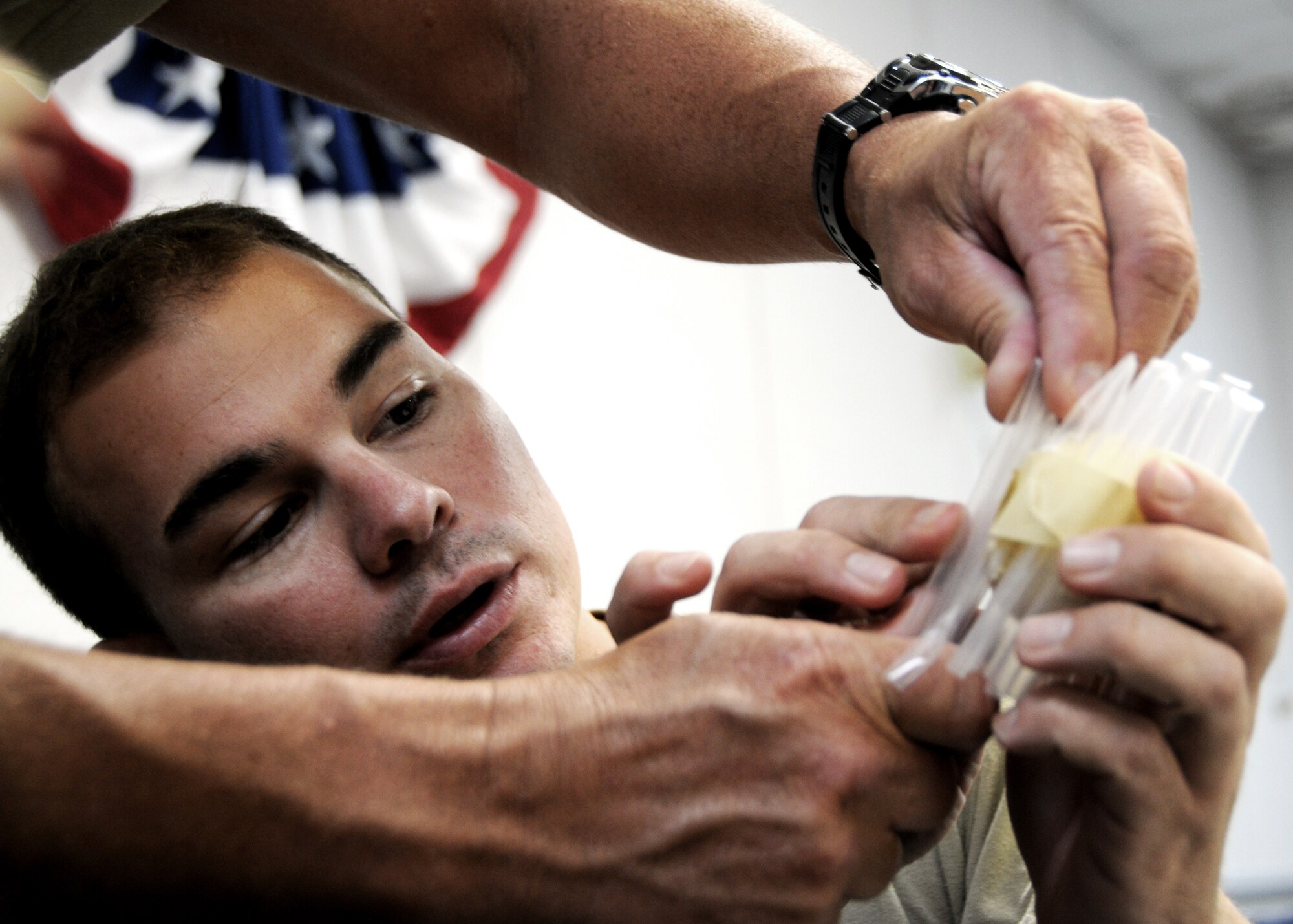 Tech. Sgt. Paul Greene, 919th Aircraft Maintenance Squadron, helps his group during the “protect the egg” project on the first week of the NCO development course at Duke Field.  22 919th Special Operations Wing NCOs and soon to be NCOs attended the two-week course to learn about leadership, management and communication.  U.S. Air Force photo /Tech. Sgt. Samuel King Jr.