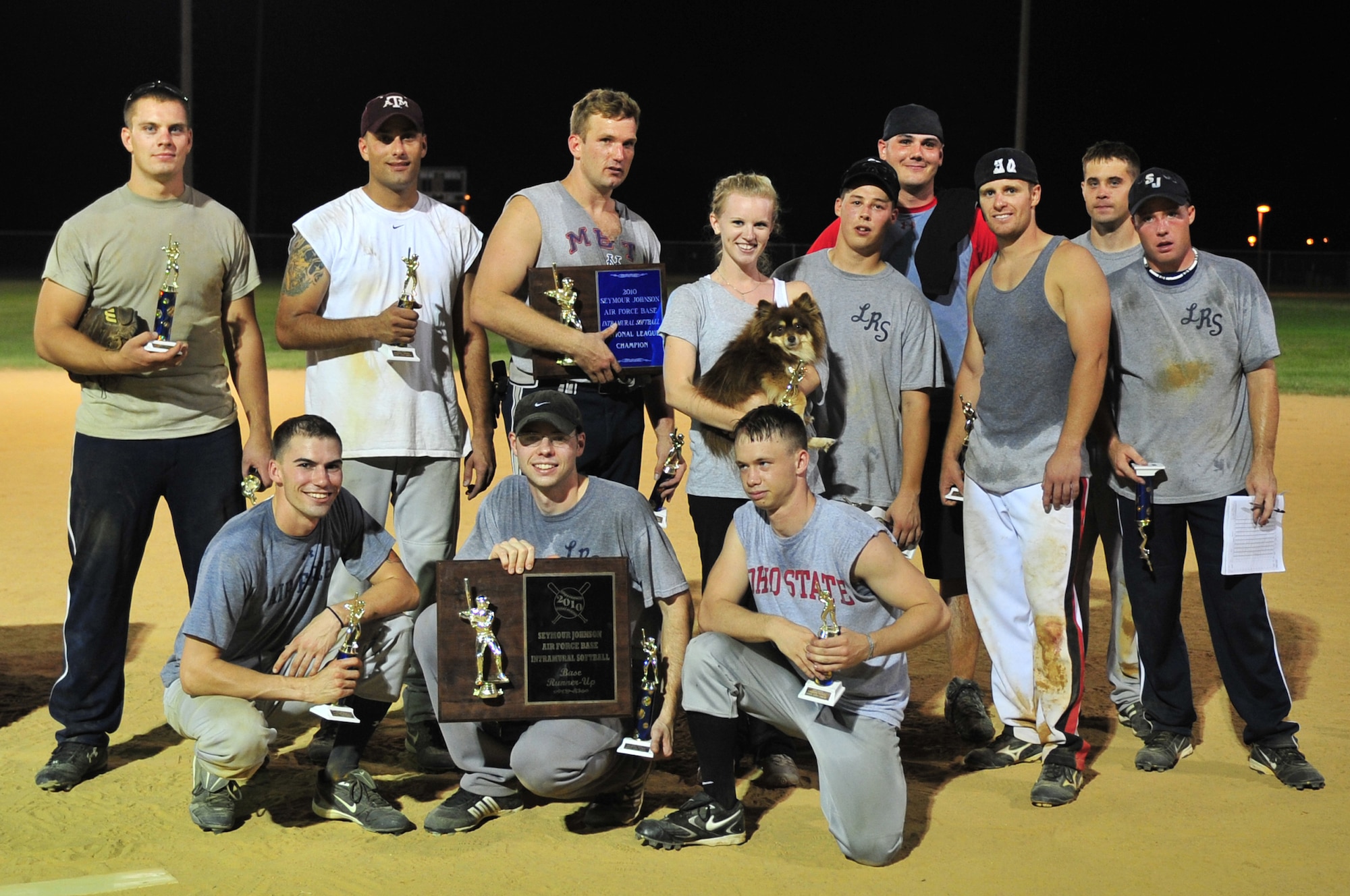 SEYMOUR JOHNSON AIR FORCE BASE, N.C. -- Members of the 4th Logistics Readiness Squadron?s softball team pose for a photo with their Eagles Grand Slam Jamboree Softball Tournament Championship runner up trophy June 21, 2010. (U.S. Air Force photo/Senior Airman Rae Perry)